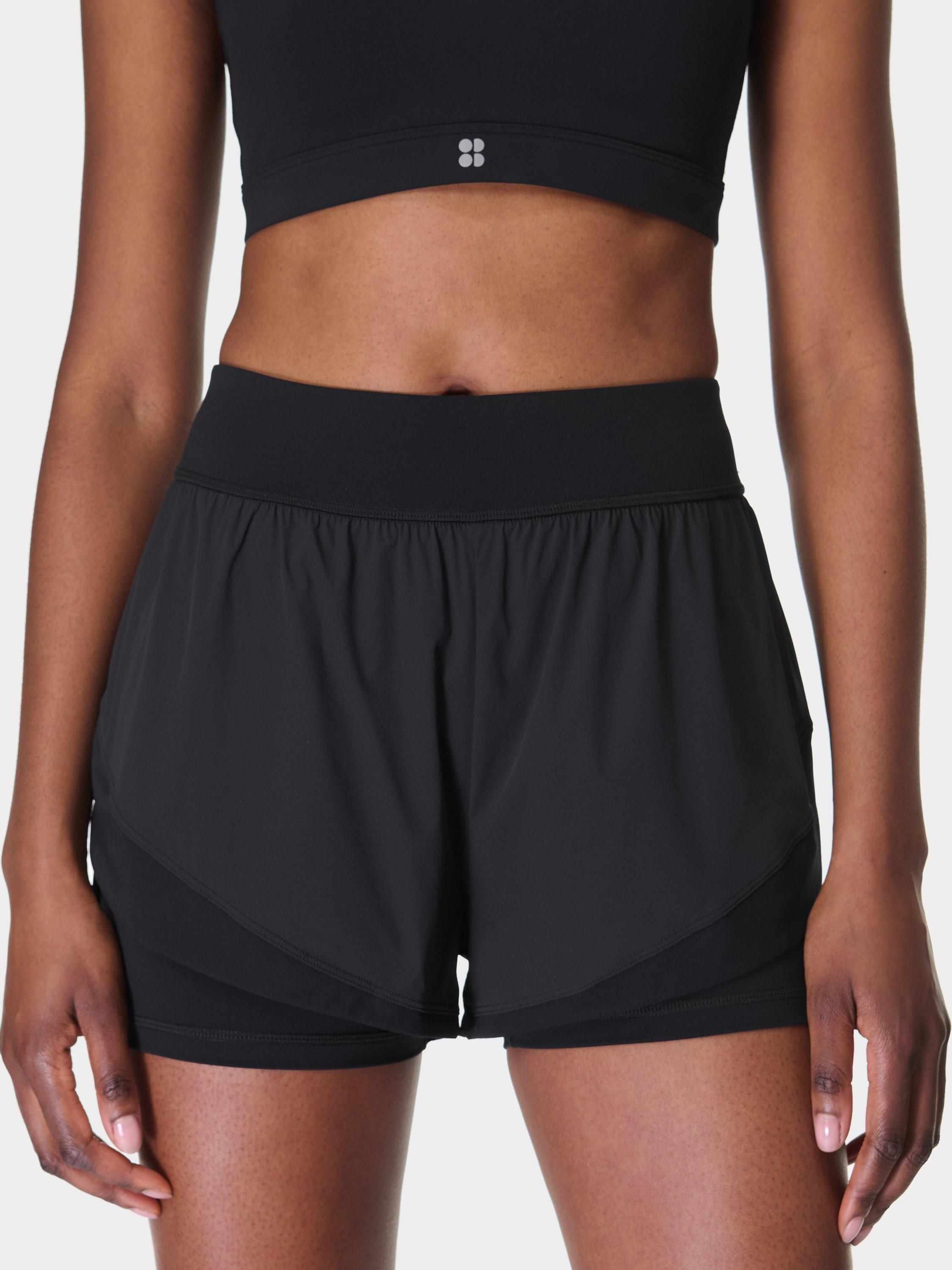 Product image 1 of 6, which shows Sweaty Betty Tempo Run Shorts, Black, XXS