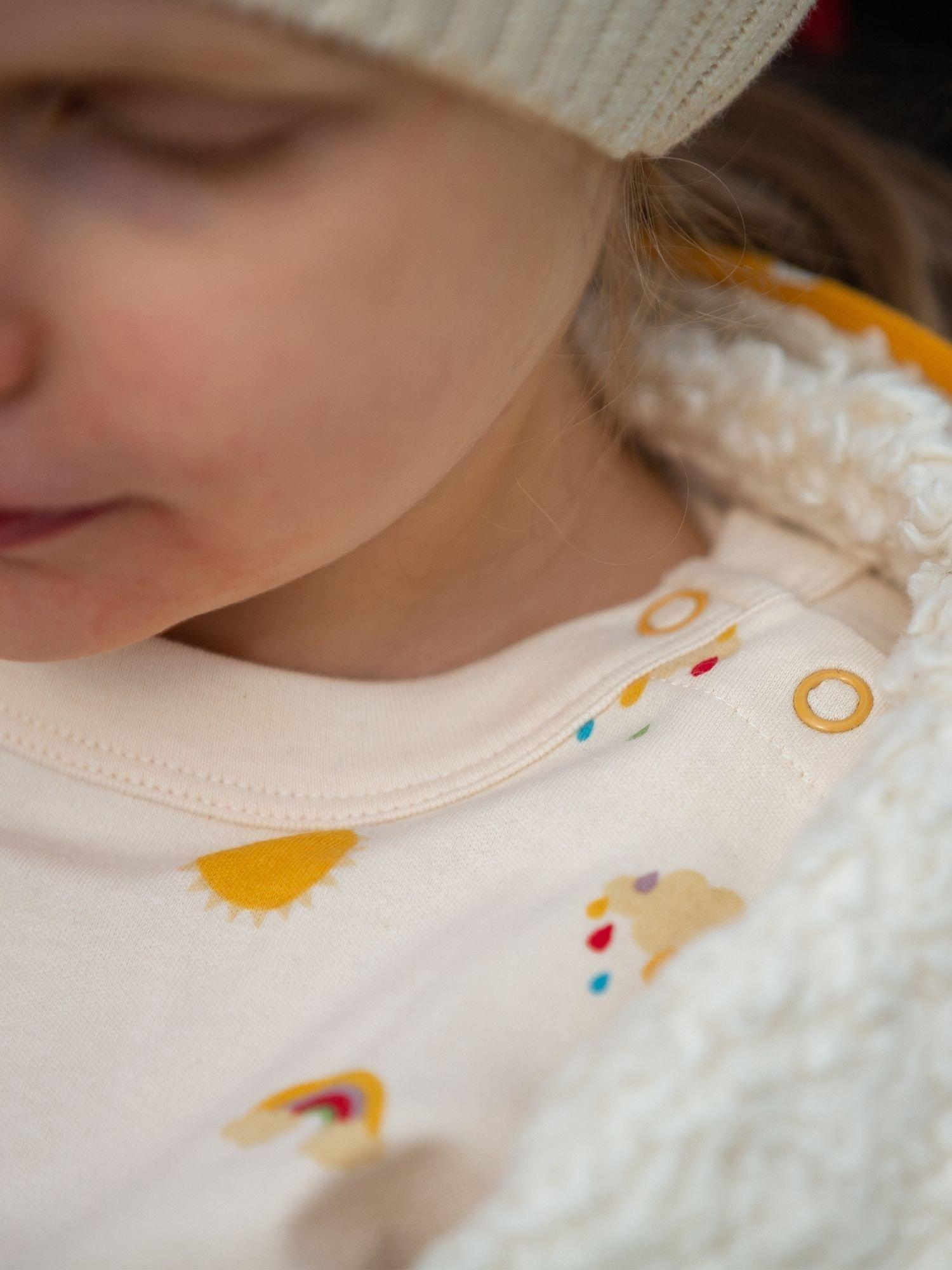 Product image 4 of 6, which shows Little Green Radicals Kids' Adaptive Organic Cotton Sunshine & Rainbow Print T-Shirt, Cream, 18-24 months