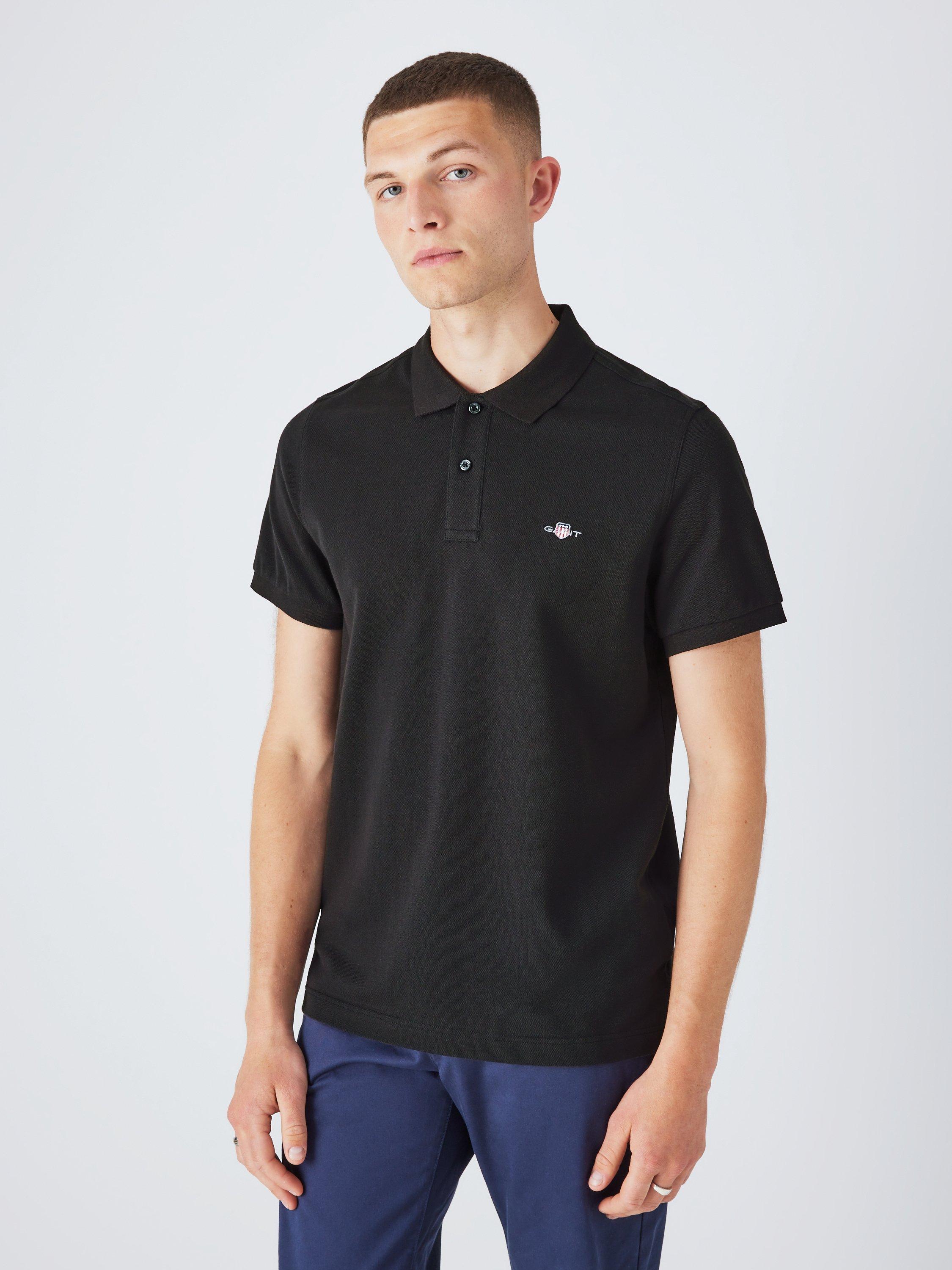 Product image 1 of 5, which shows GANT Regular Shield Short Sleeve Pique Polo Top, 005 Black, S