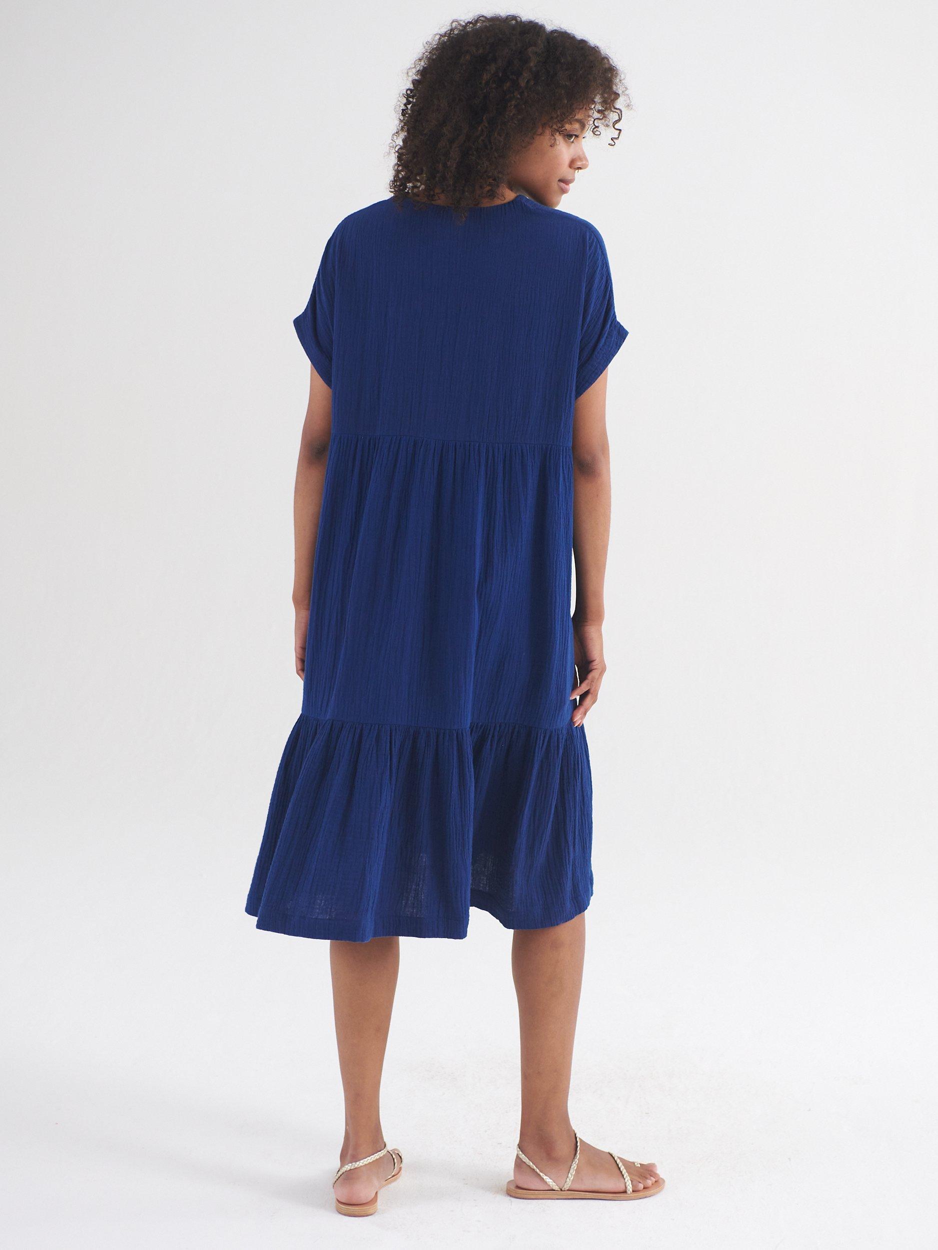 Product image 3 of 7, which shows NRBY Gia Double Cloth Tiered Dress, Navy, XS