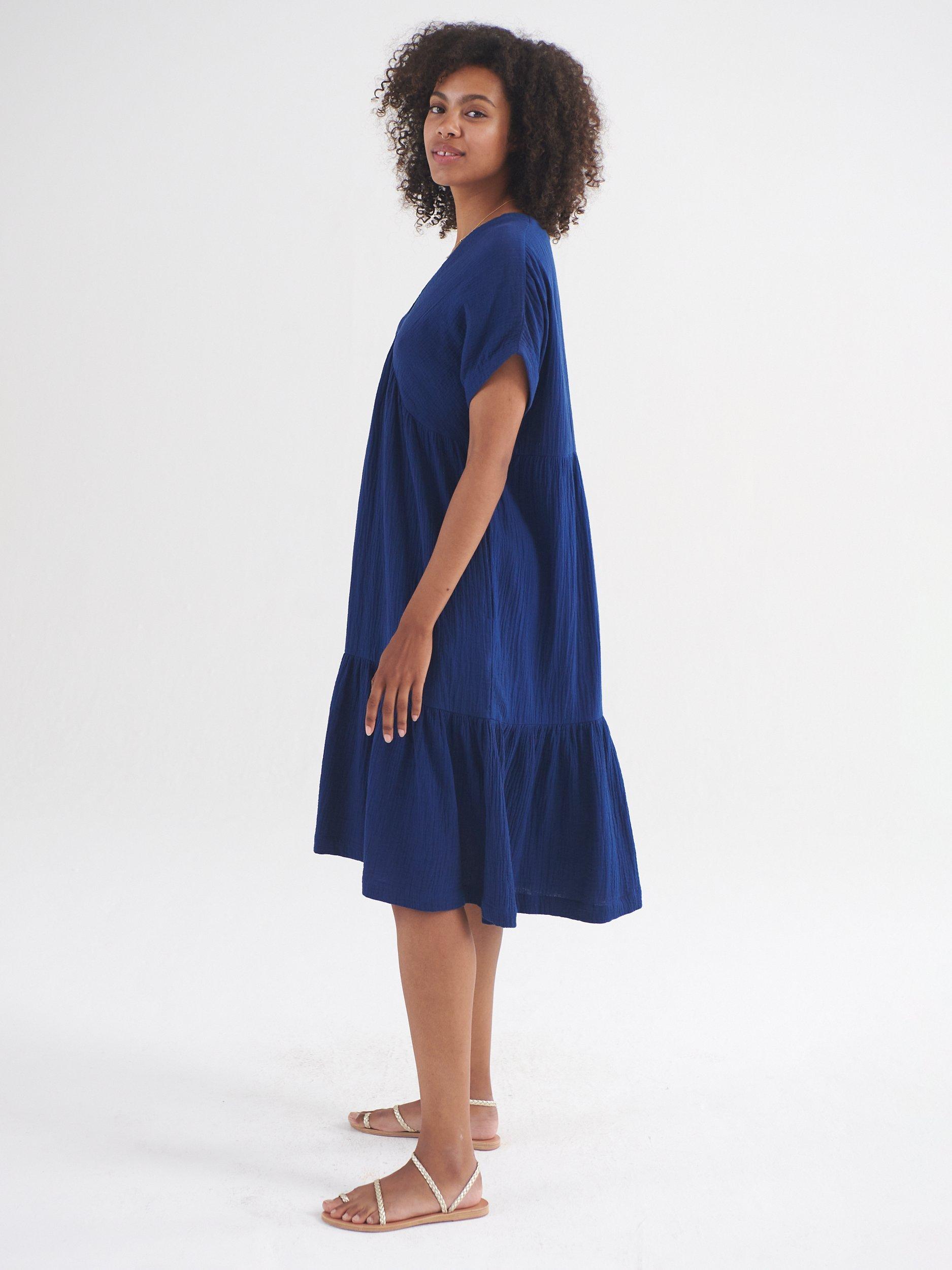 Product image 4 of 7, which shows NRBY Gia Double Cloth Tiered Dress, Navy, XS