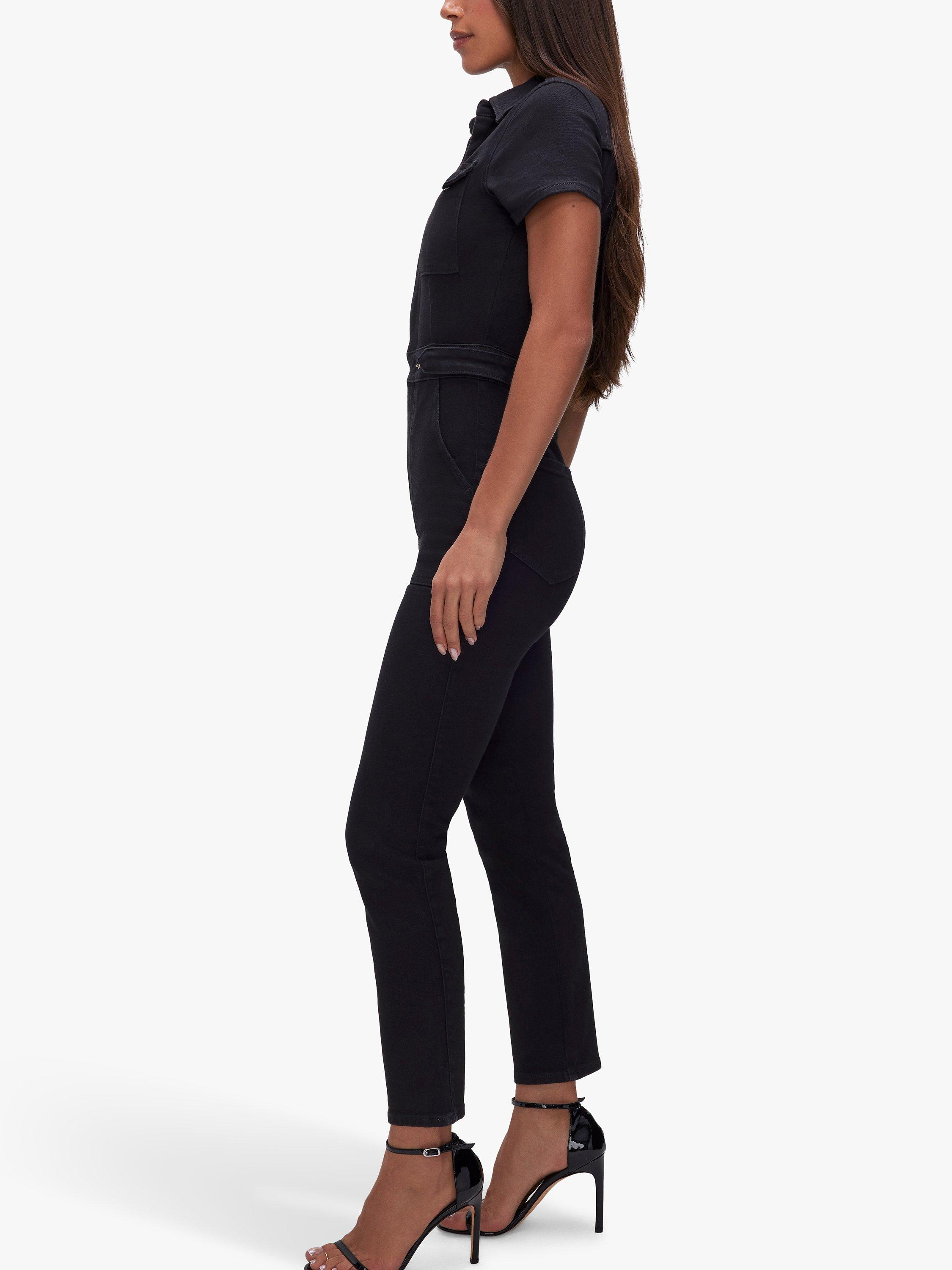 Product image 4 of 7, which shows Good American Short Sleeve Denim Jumpsuit, Black, XS