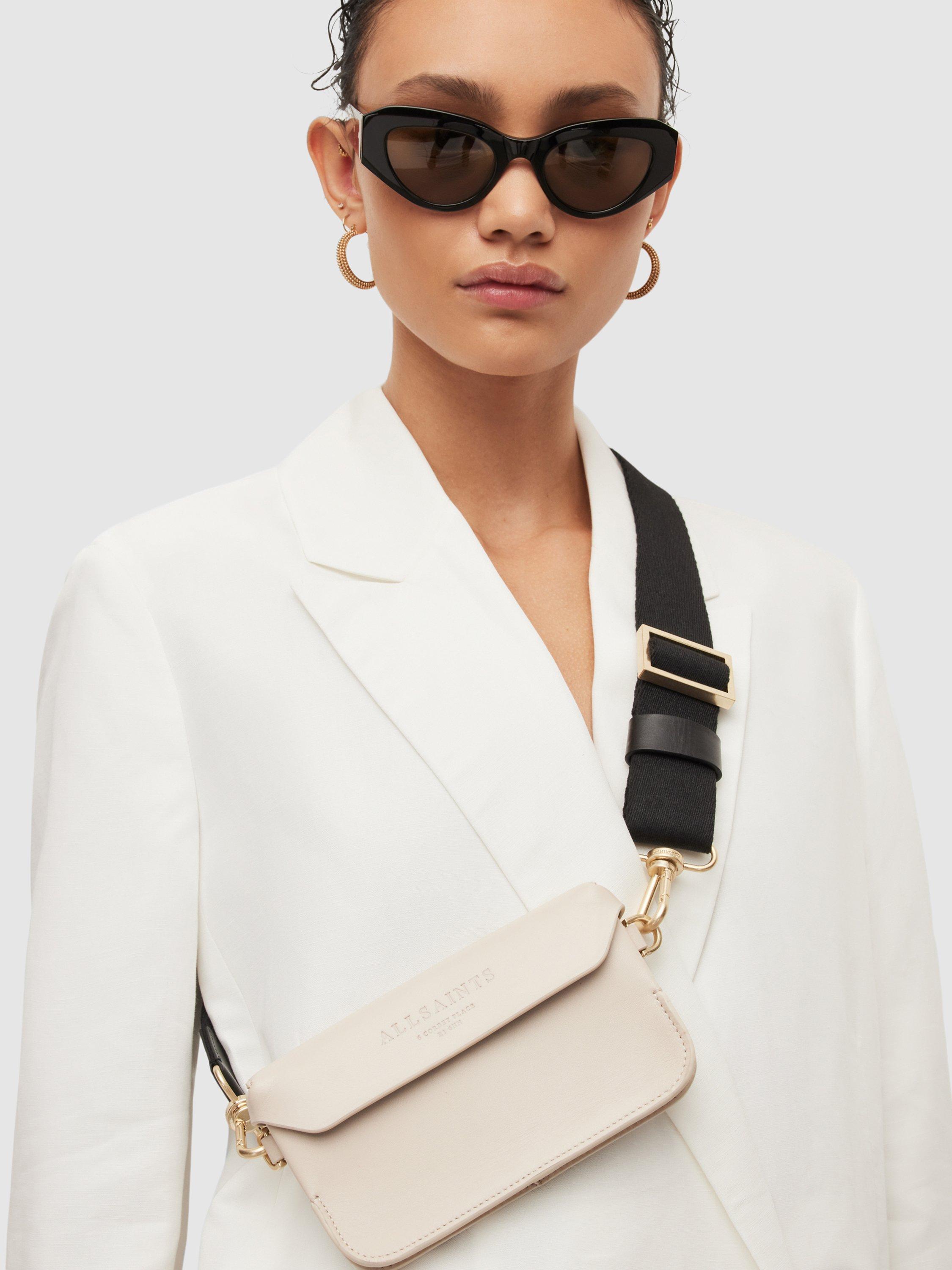 Product image 1 of 7, which shows AllSaints Zoe Leather Cross Body Bag, Ivory White, One Size
