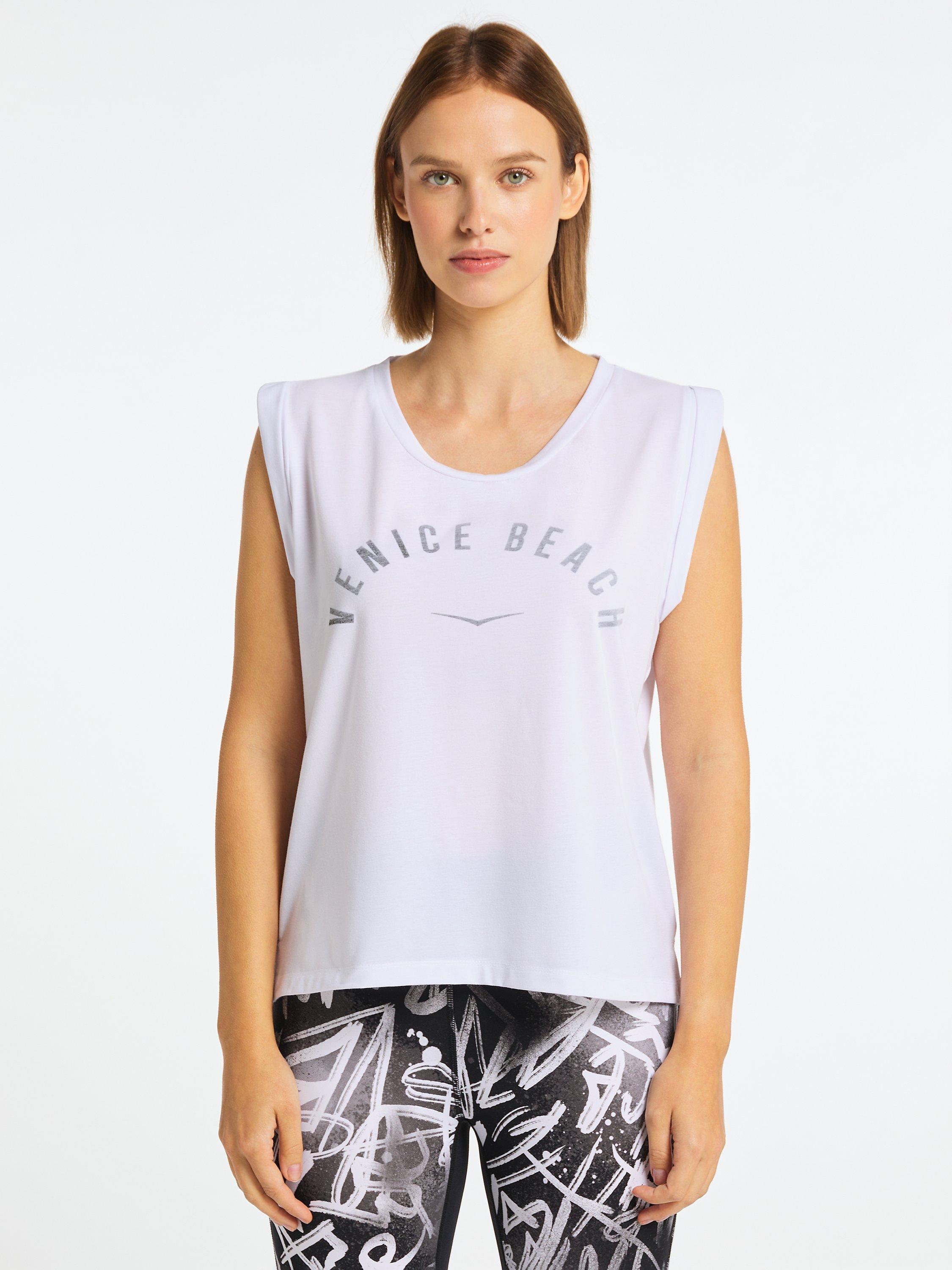 Product image 1 of 7, which shows Venice Beach Chayanne Sleeveless Gym Top, White, M