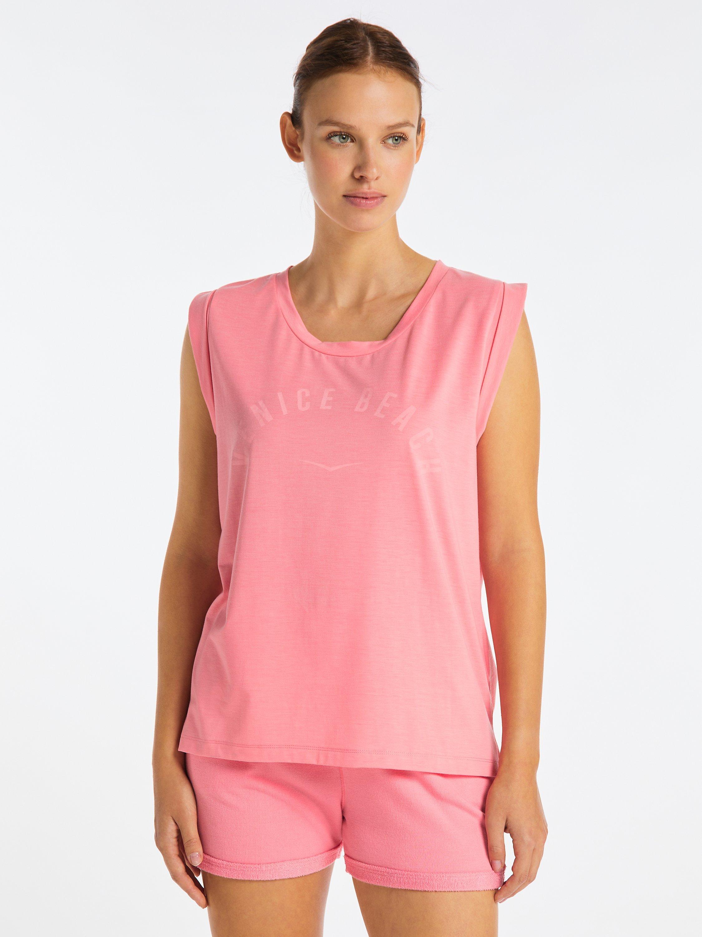 Product image 1 of 7, which shows Venice Beach Chayanne Sleeveless Gym Top, Sunset Peach, S