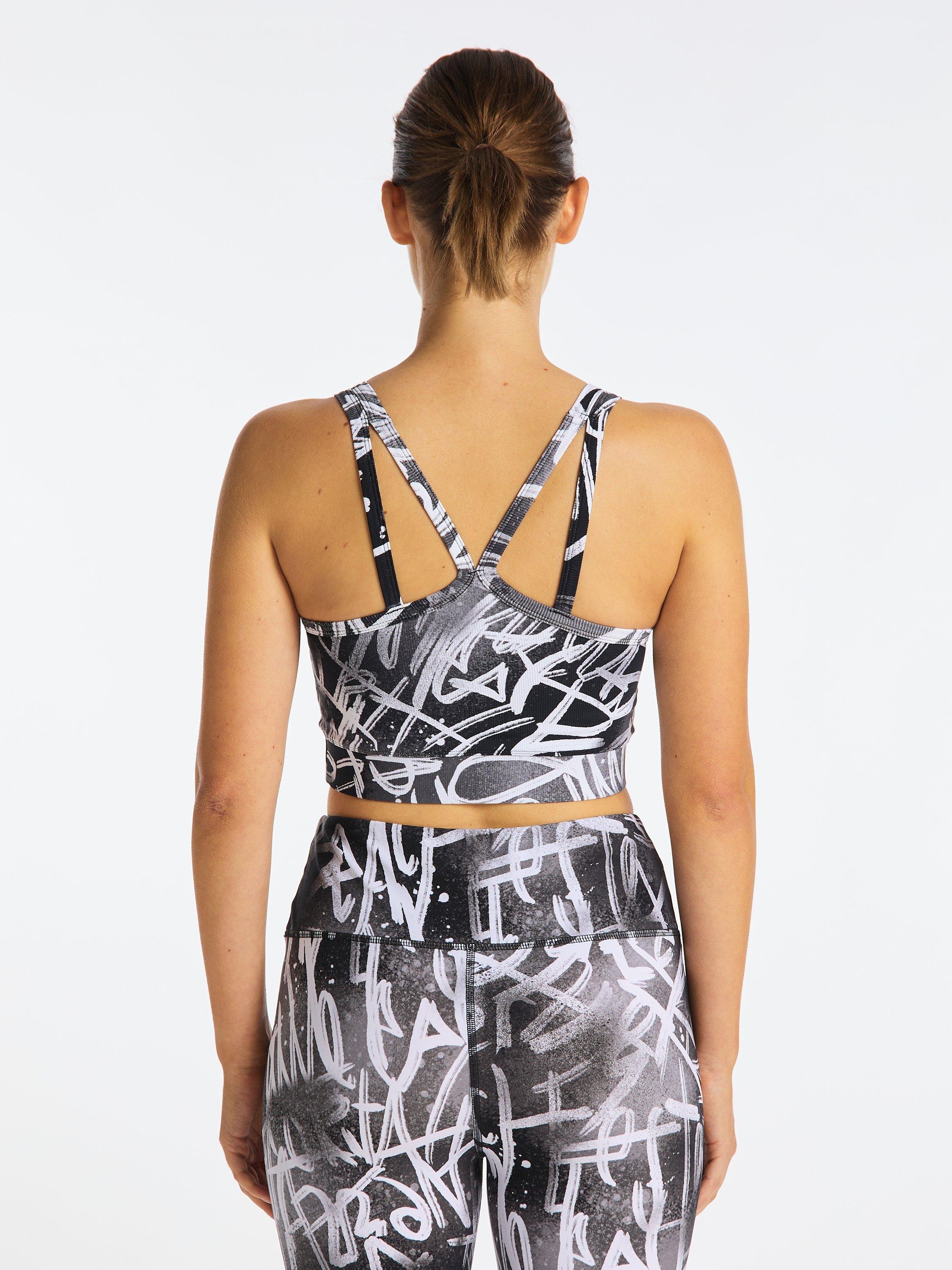 Product image 2 of 7, which shows Venice Beach Violet Medium Impact Sports Bra, Aop Graffiti Walls, XS