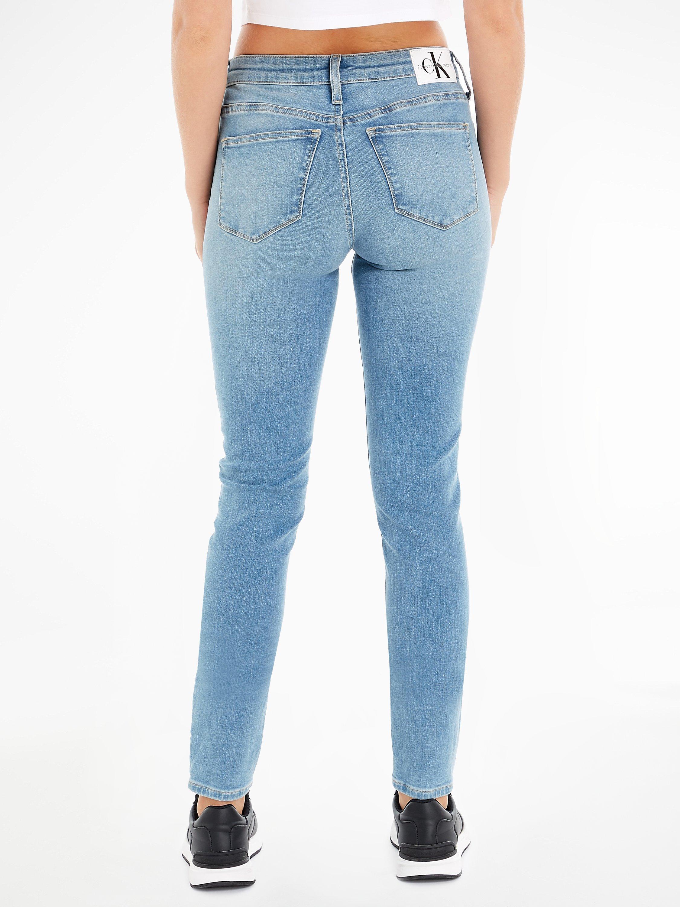 Product image 2 of 5, which shows Calvin Klein Mid Rise Skinny Jeans, Light Blue, 34L