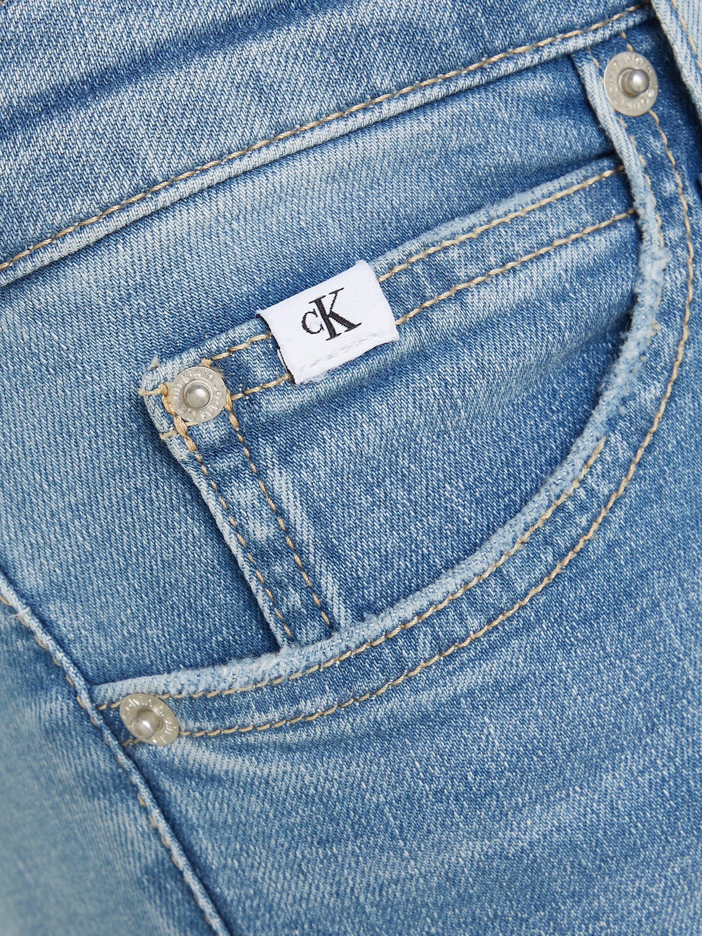 Product image 5 of 5, which shows Calvin Klein Mid Rise Skinny Jeans, Light Blue, 34L
