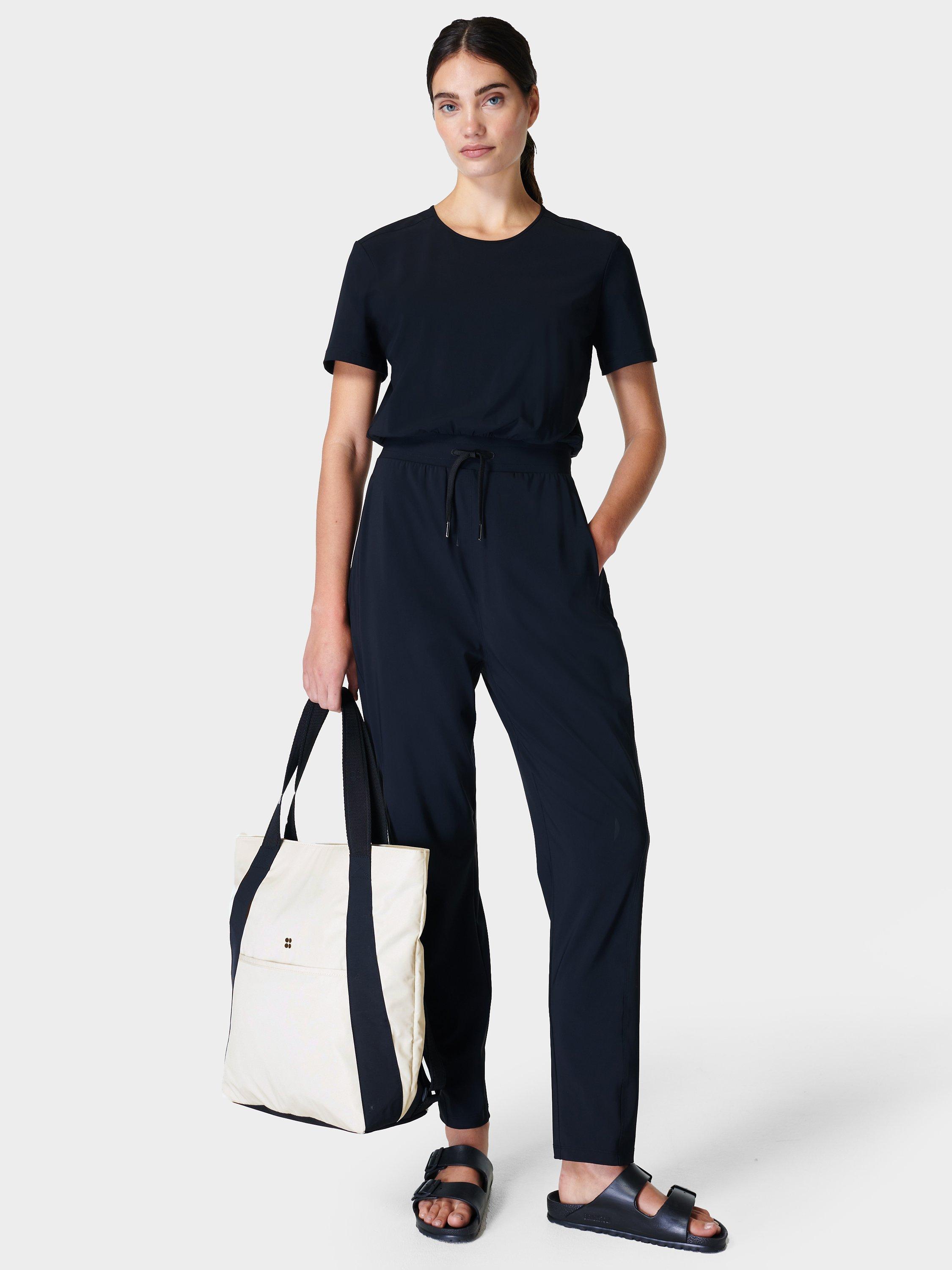 Product image 1 of 4, which shows Sweaty Betty Explorer Jumpsuit 27", Black, XXS
