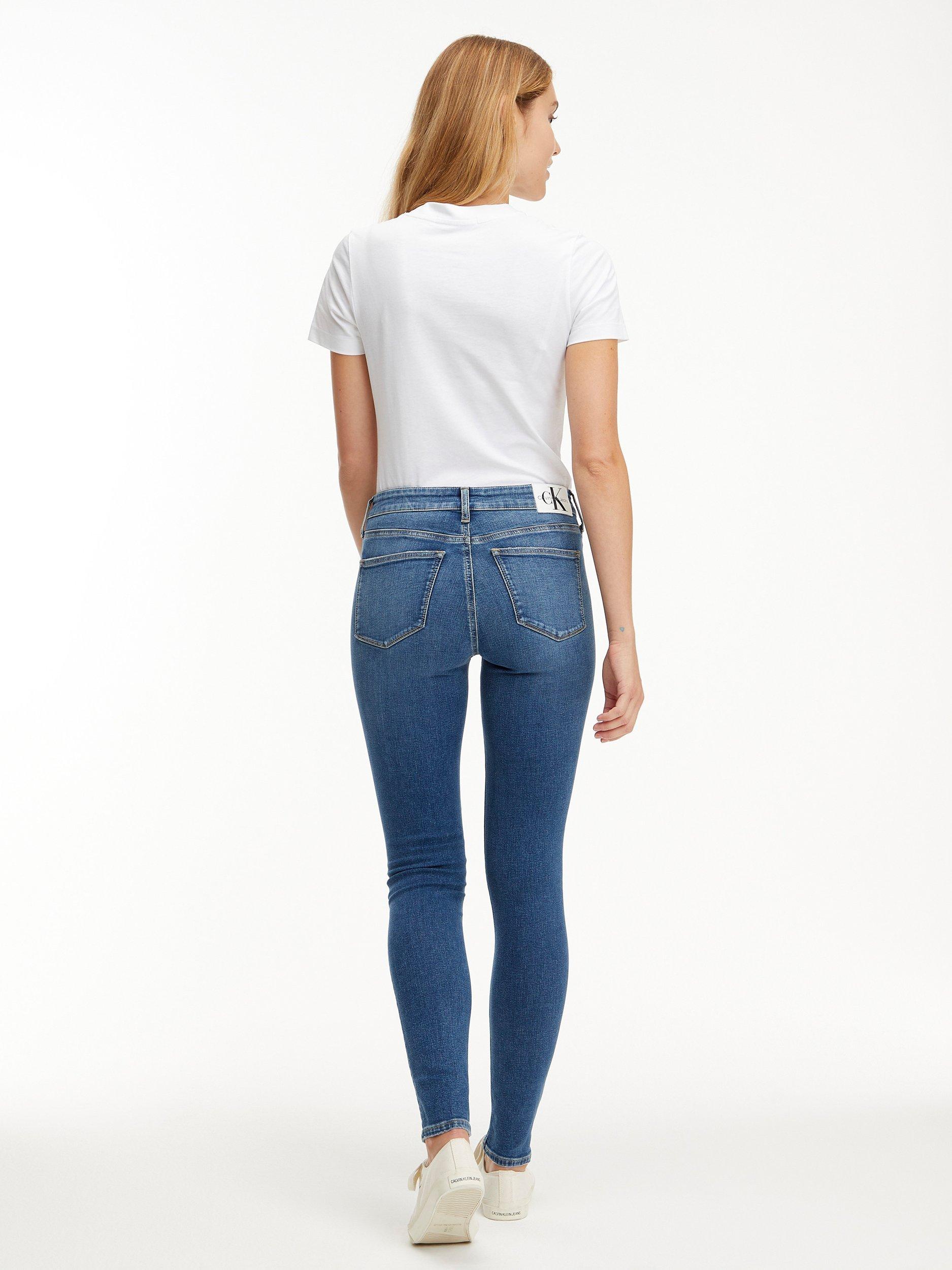 Product image 3 of 6, which shows Calvin Klein Mid Rise Skinny Jeans, Denim Dark, 26R