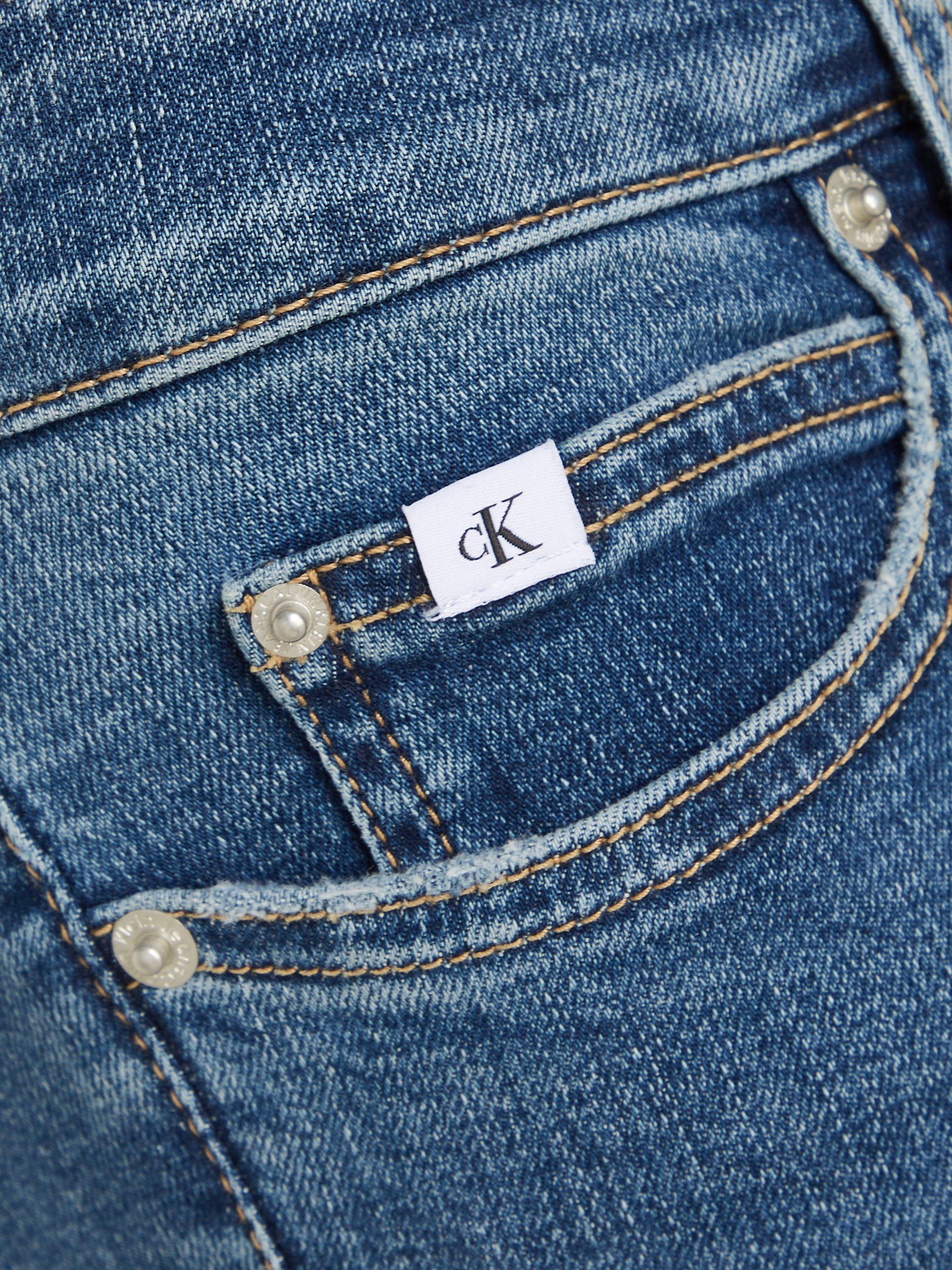 Product image 6 of 6, which shows Calvin Klein Mid Rise Skinny Jeans, Denim Dark, 26R