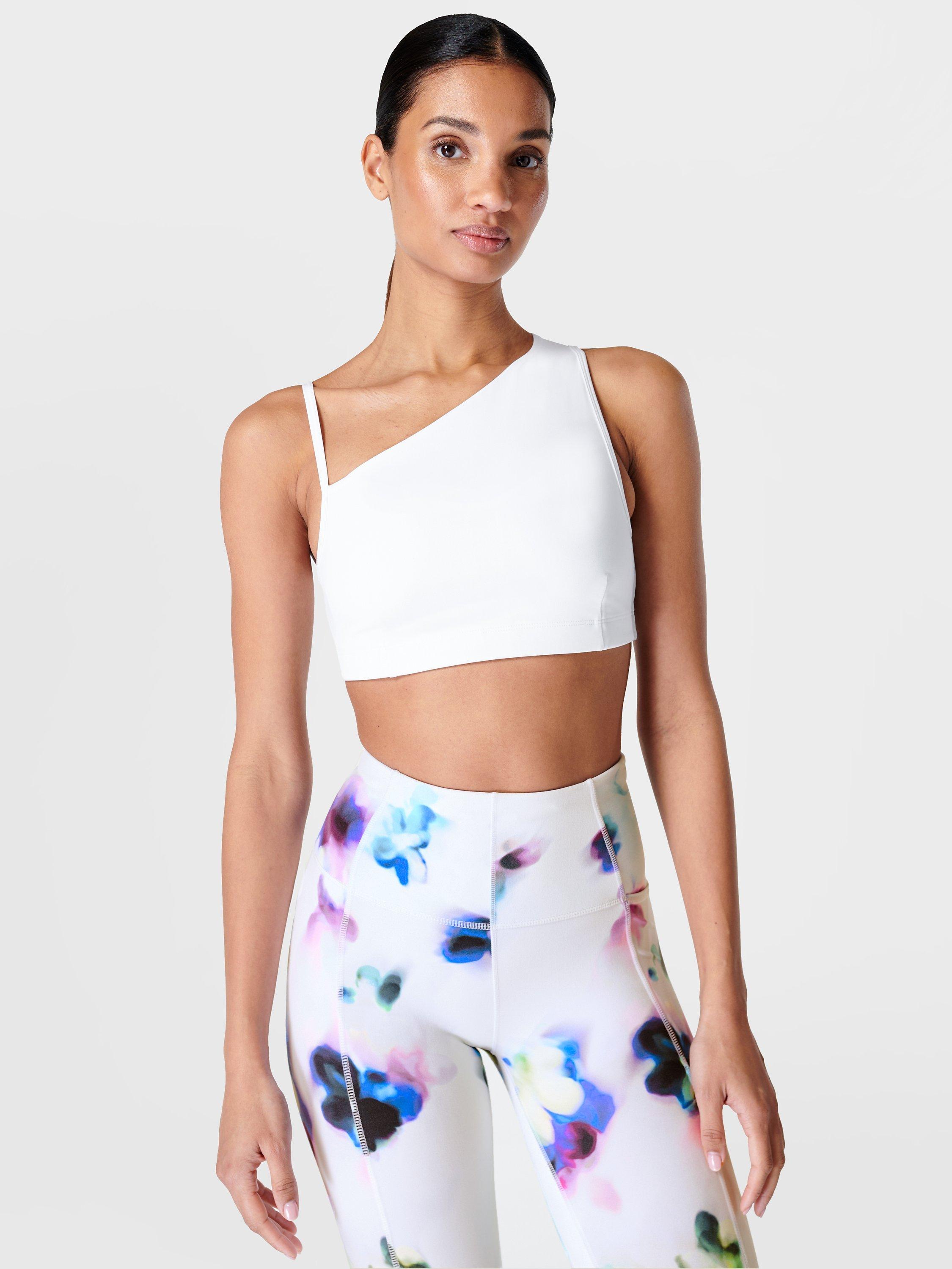 Product image 1 of 6, which shows Sweaty Betty Asymmetrical Sports Bralette, White, XS