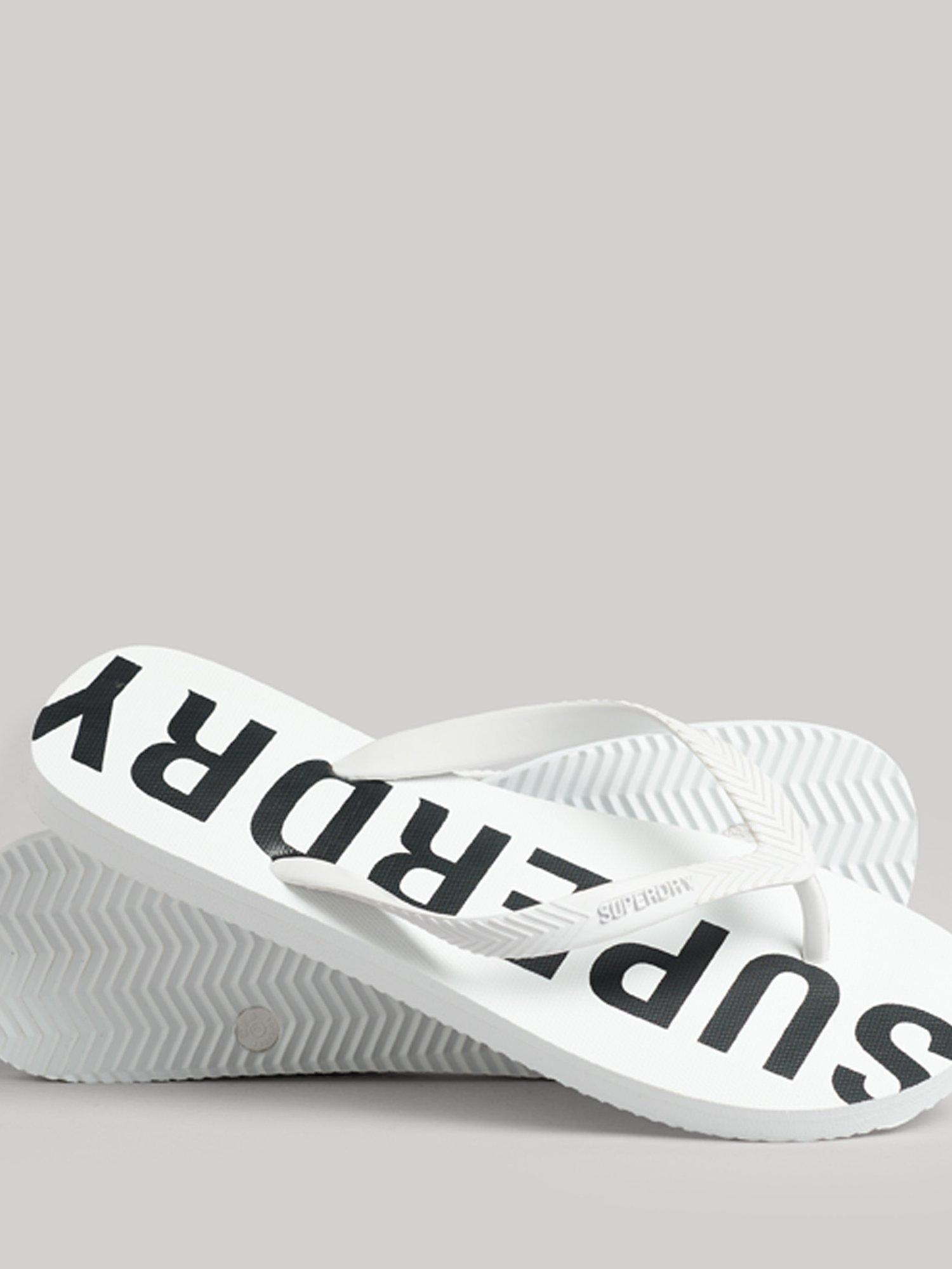 Product image 1 of 3, which shows Superdry Code Core Sport Flip Flops, Optic/Black, S