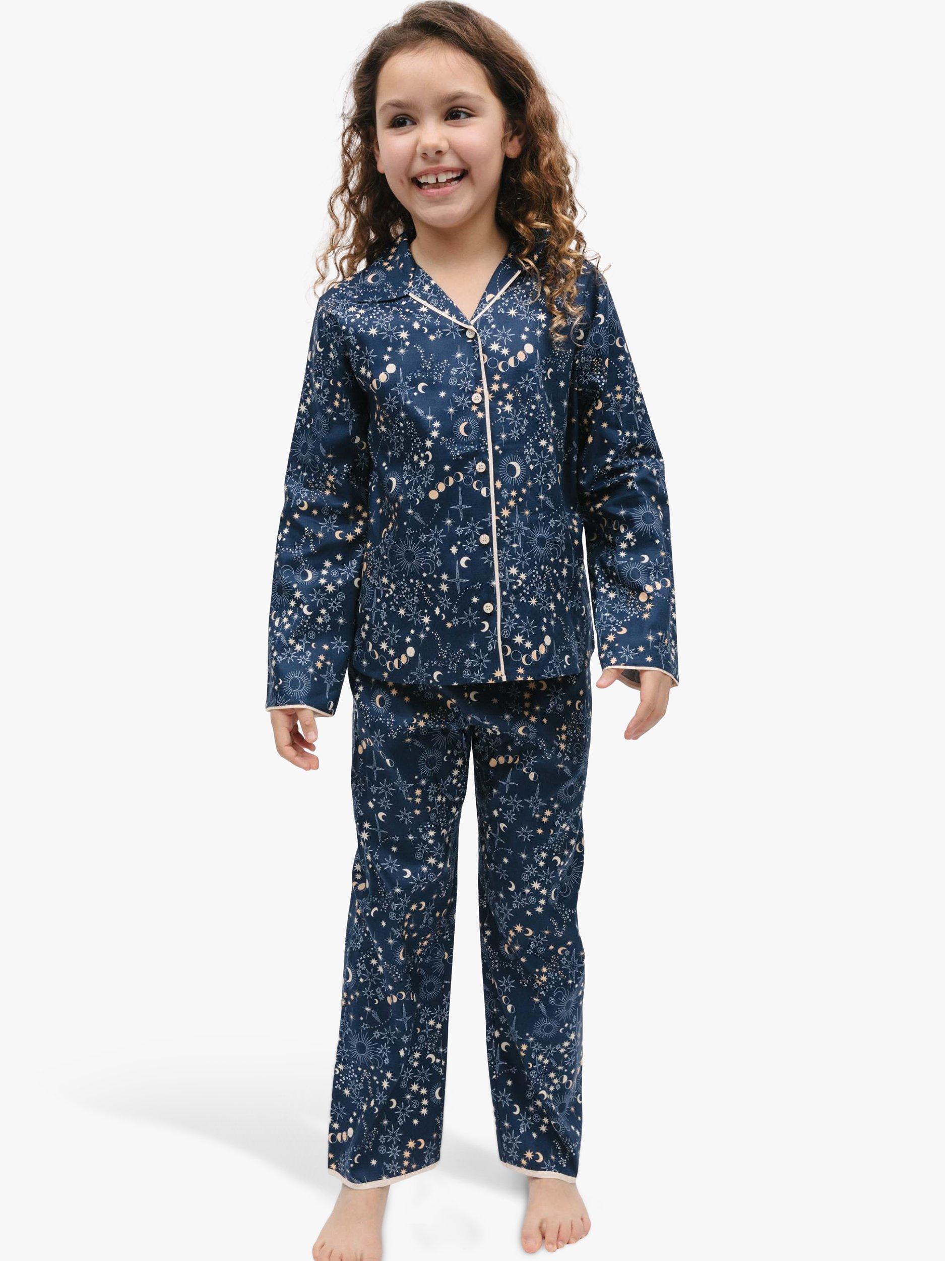 Product image 1 of 4, which shows Minijammies Kids' Cosmo Celestial Print Pyjamas, Navy, 10-11 years