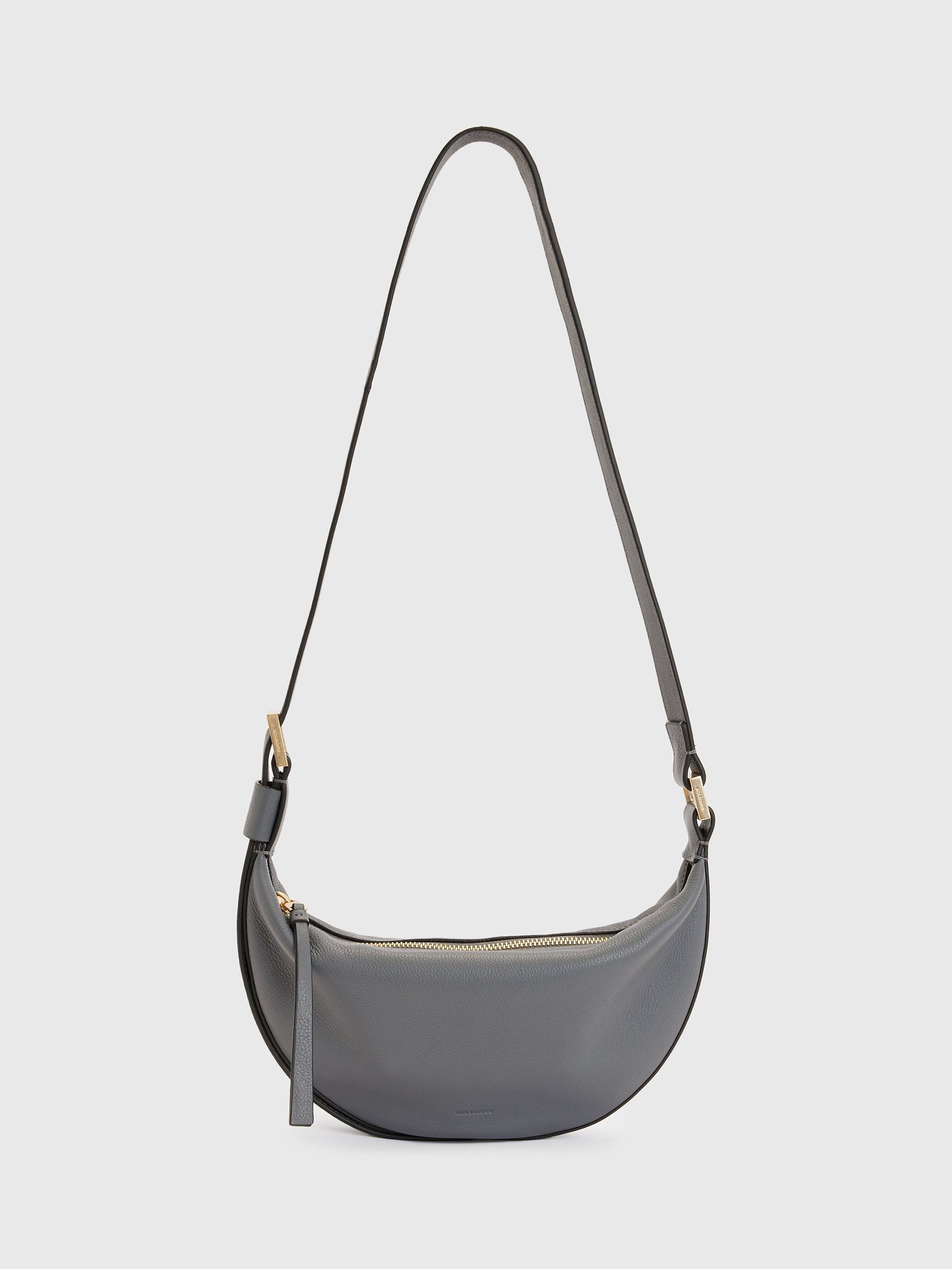 Product image 1 of 7, which shows AllSaints Half Moon Leather Cross Body Bag, Slate Grey