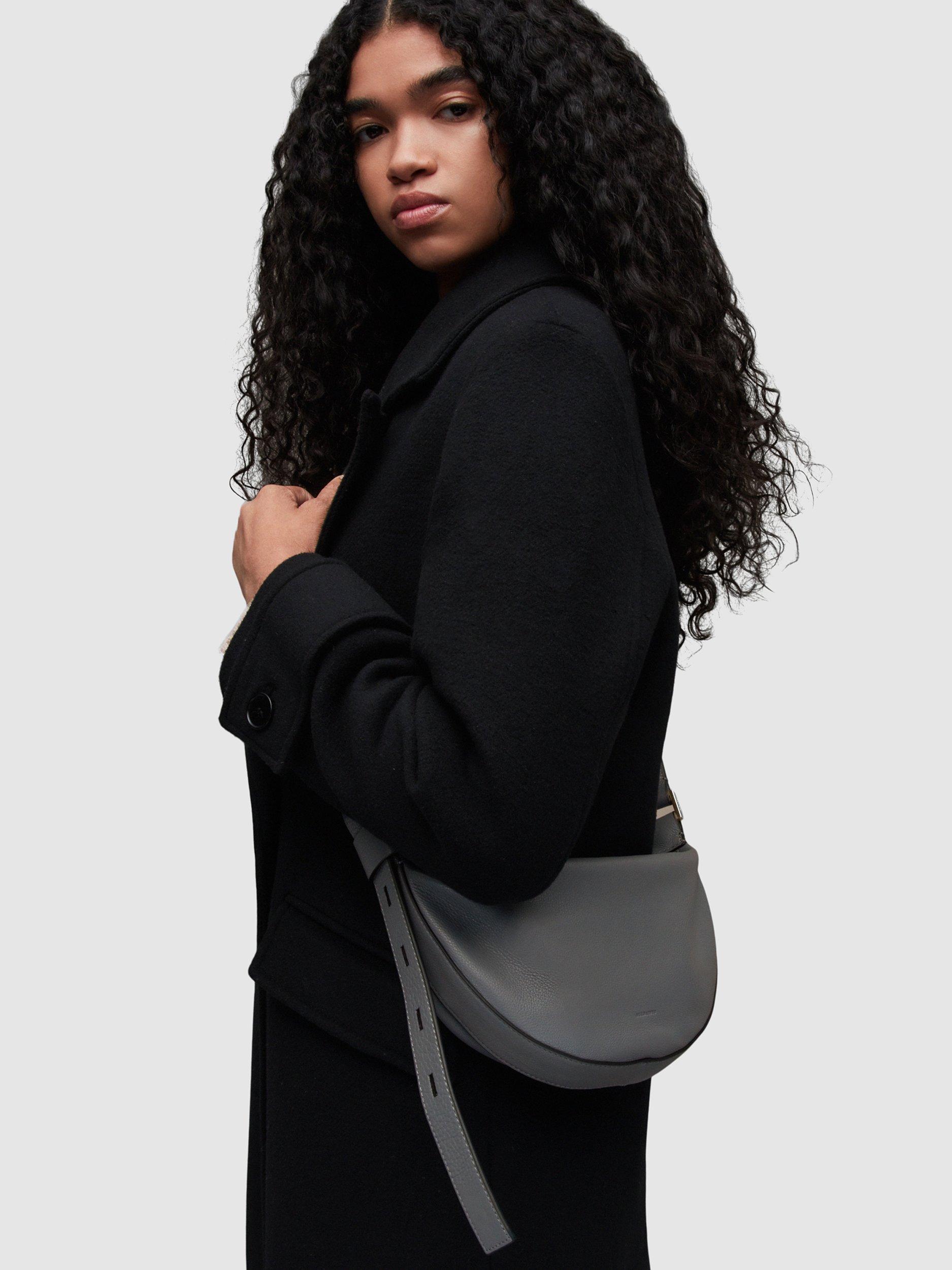 Product image 2 of 7, which shows AllSaints Half Moon Leather Cross Body Bag, Slate Grey