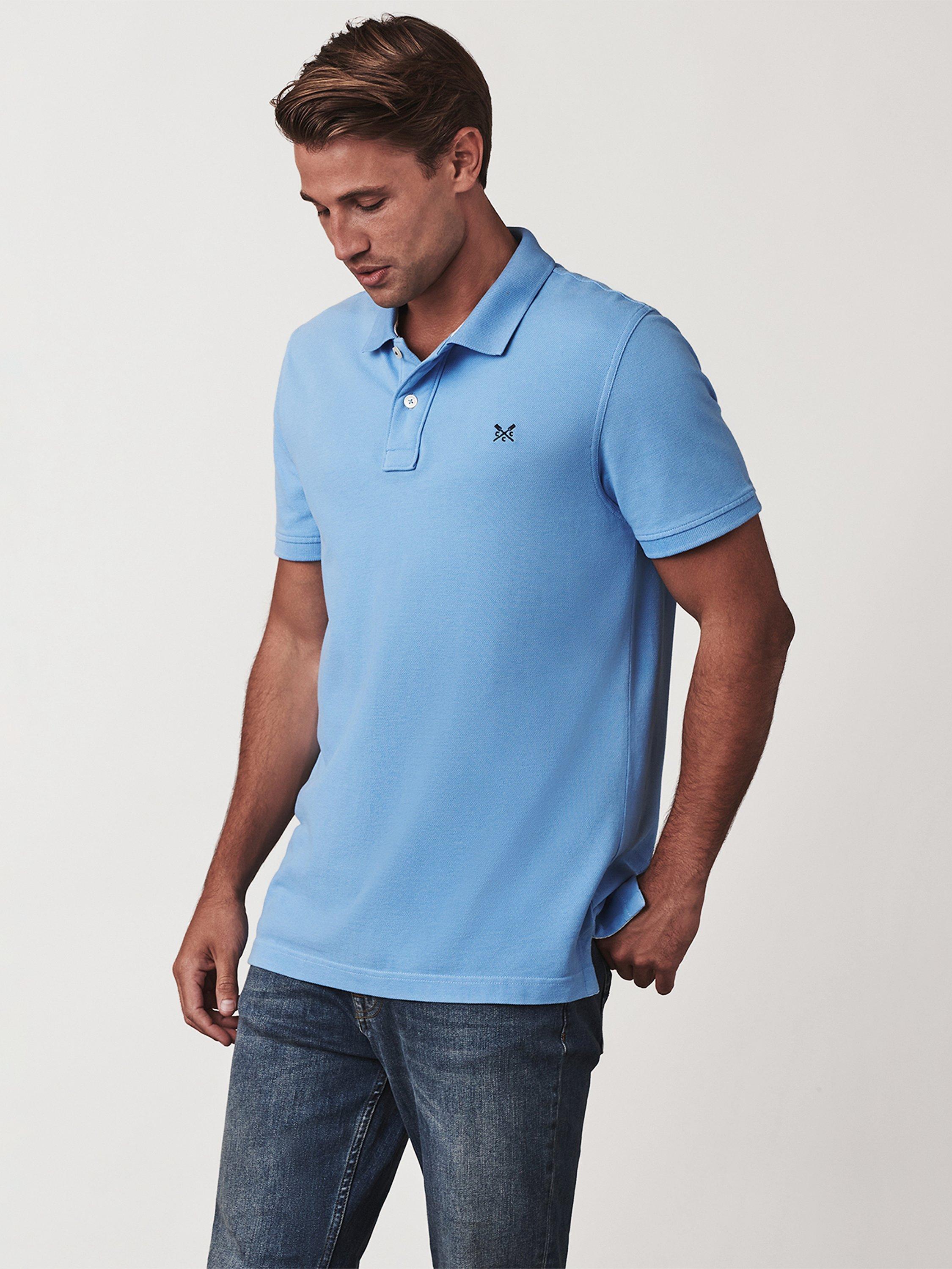 Product image 1 of 6, which shows Crew Clothing Classic Pique Polo Shirt, Bright Blue, XS