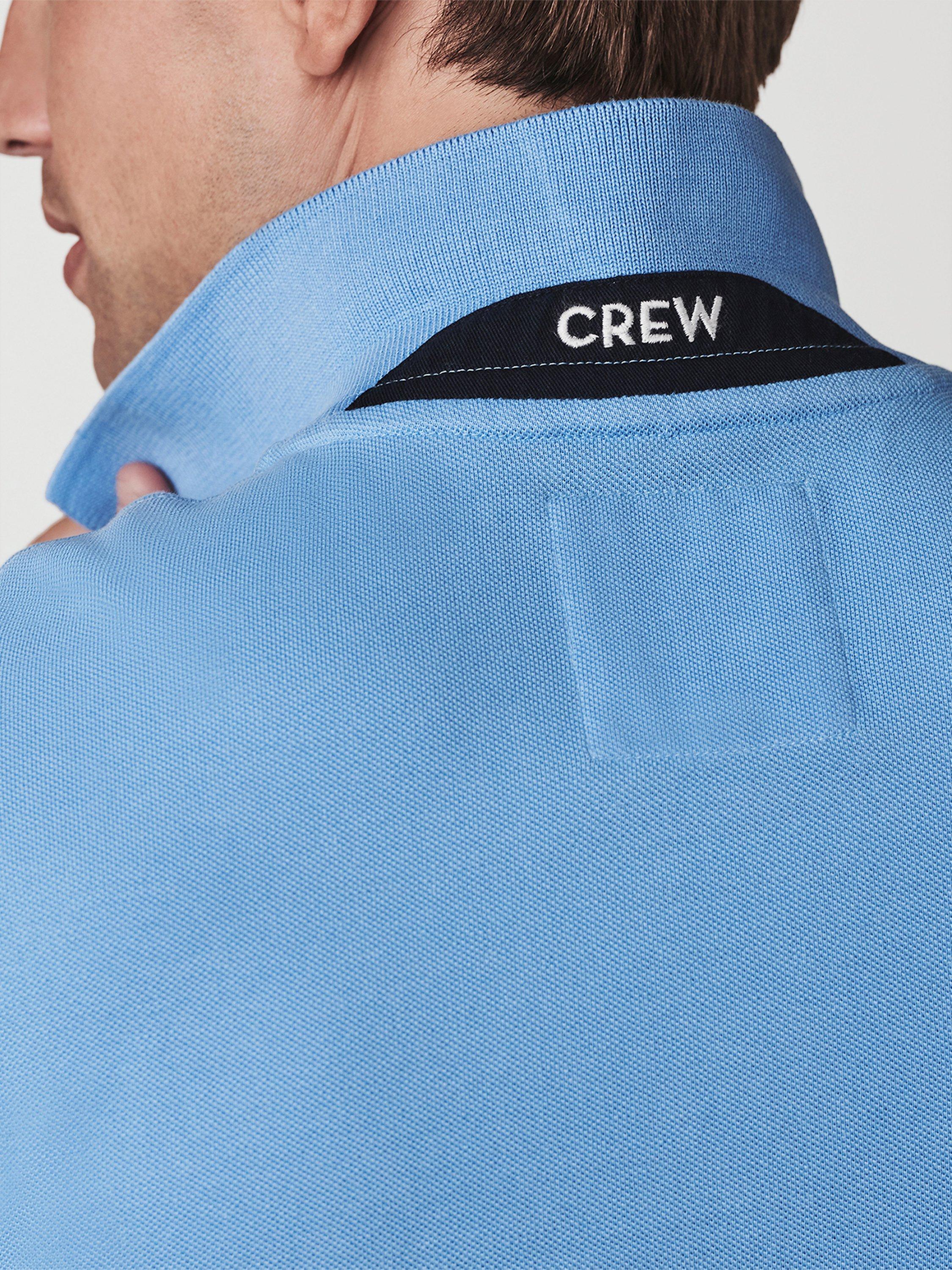 Product image 5 of 6, which shows Crew Clothing Classic Pique Polo Shirt, Bright Blue, XS