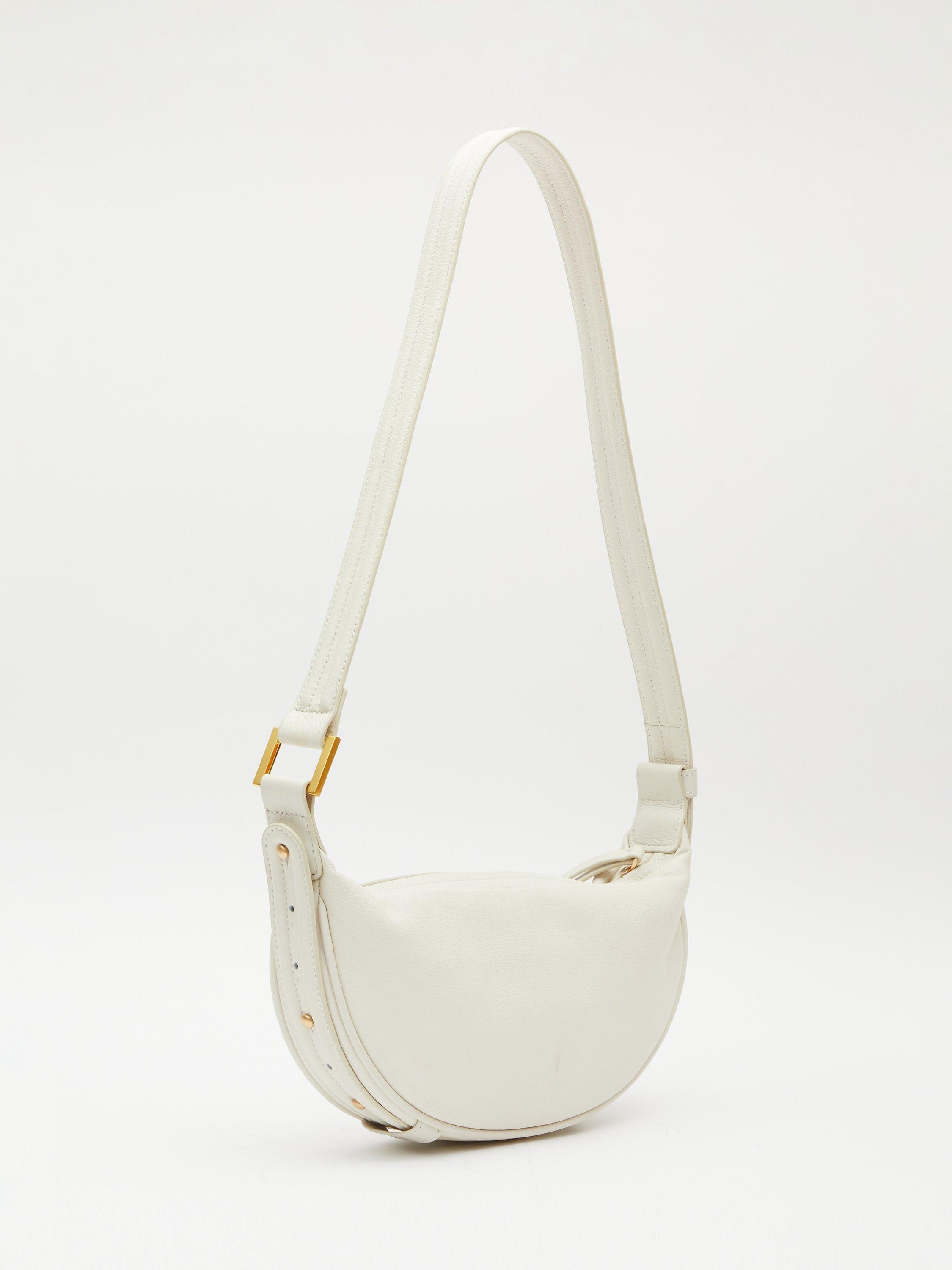 Product image 2 of 6, which shows HUSH Rory Crescent Leather Crossbody Bag, Bone, One Size
