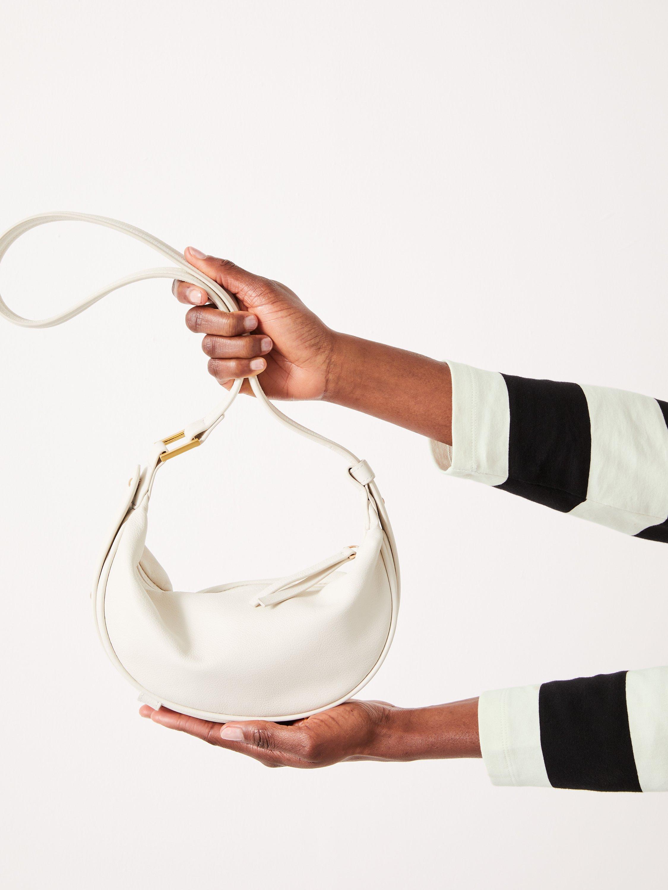 Product image 4 of 6, which shows HUSH Rory Crescent Leather Crossbody Bag, Bone, One Size