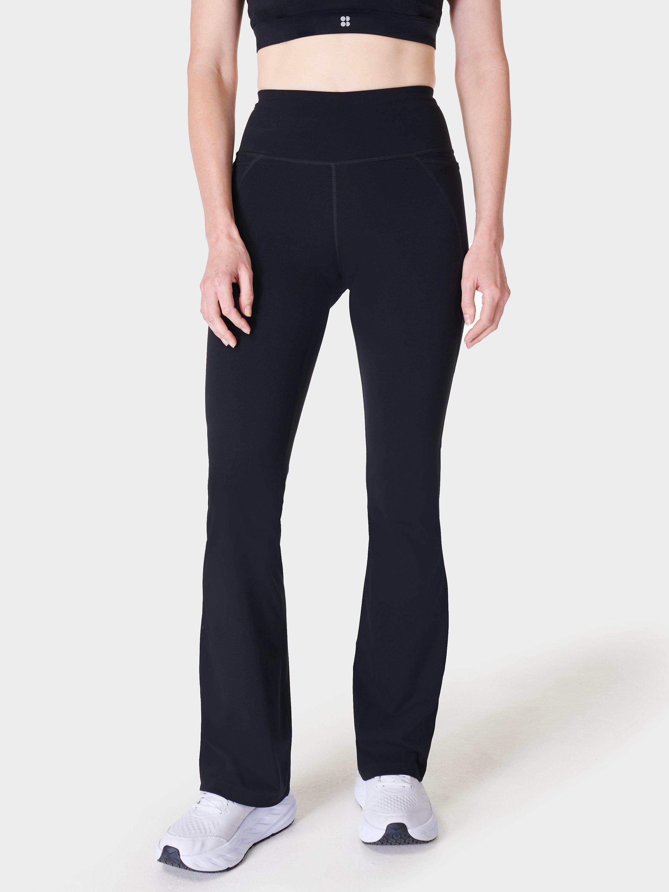 Product image 1 of 6, which shows Sweaty Betty 30" Power Bootcut Gym Trousers, Black, XXS