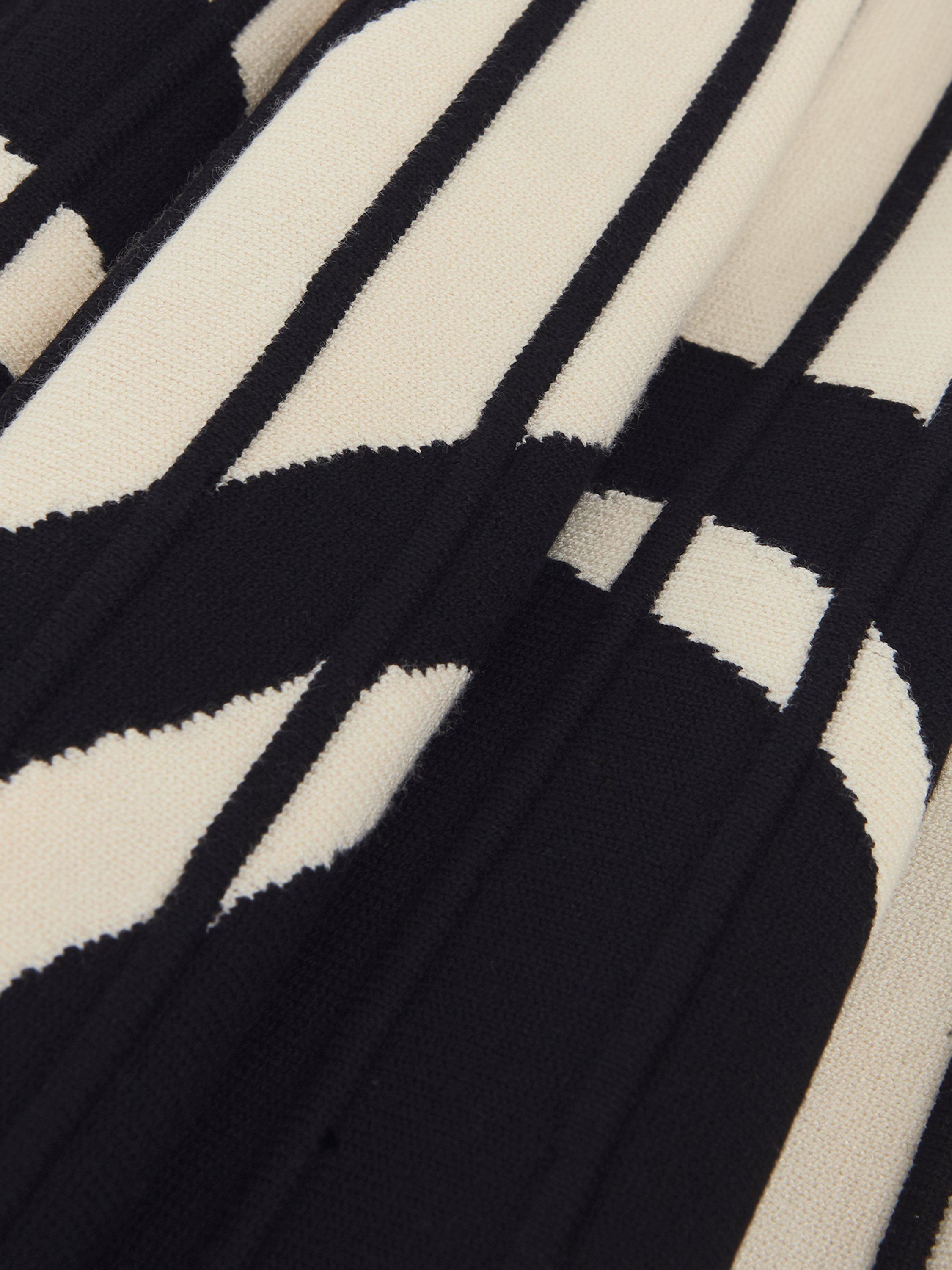 Product image 6 of 7, which shows Phase Eight Silvia Abstract Print Knit Dress, Black/Ivory, 10