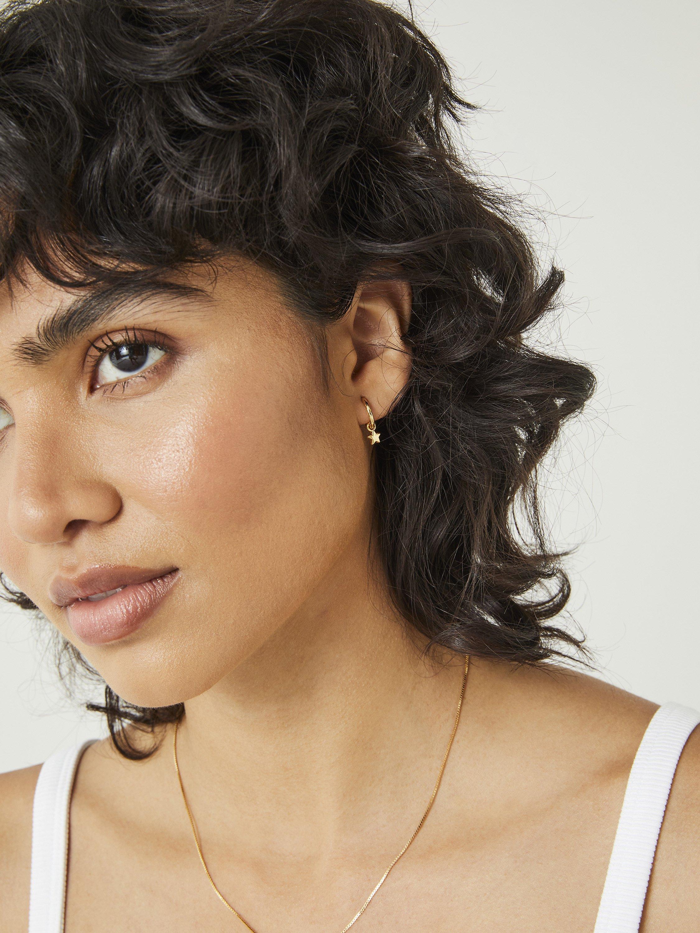 Product image 2 of 4, which shows HUSH Star Drop Huggie Hoop Earrings, Gold, One Size