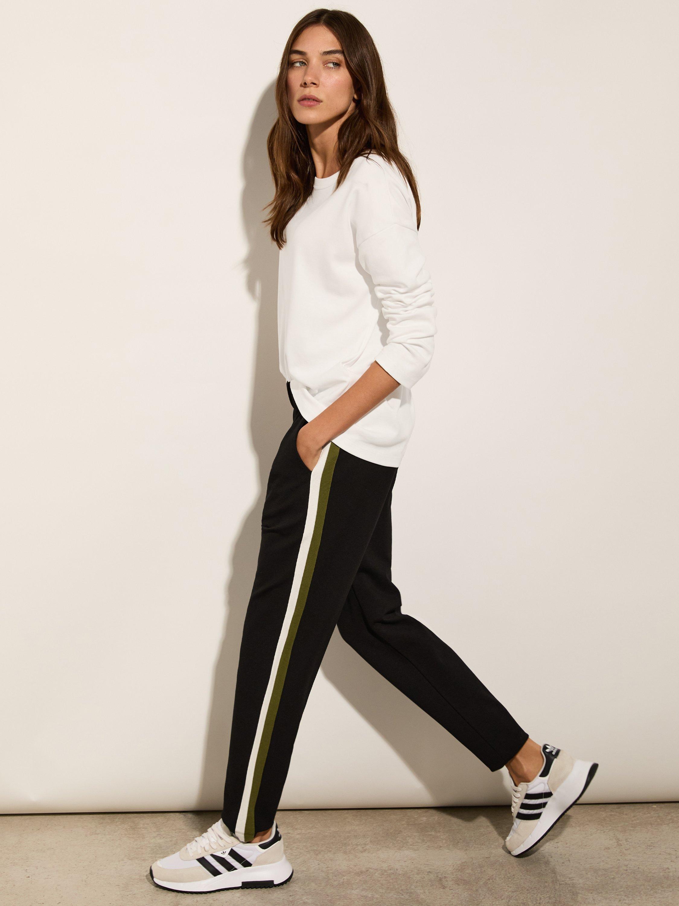 Product image 1 of 4, which shows Baukjen Jay Trousers, Caviar Black/Olive, 10