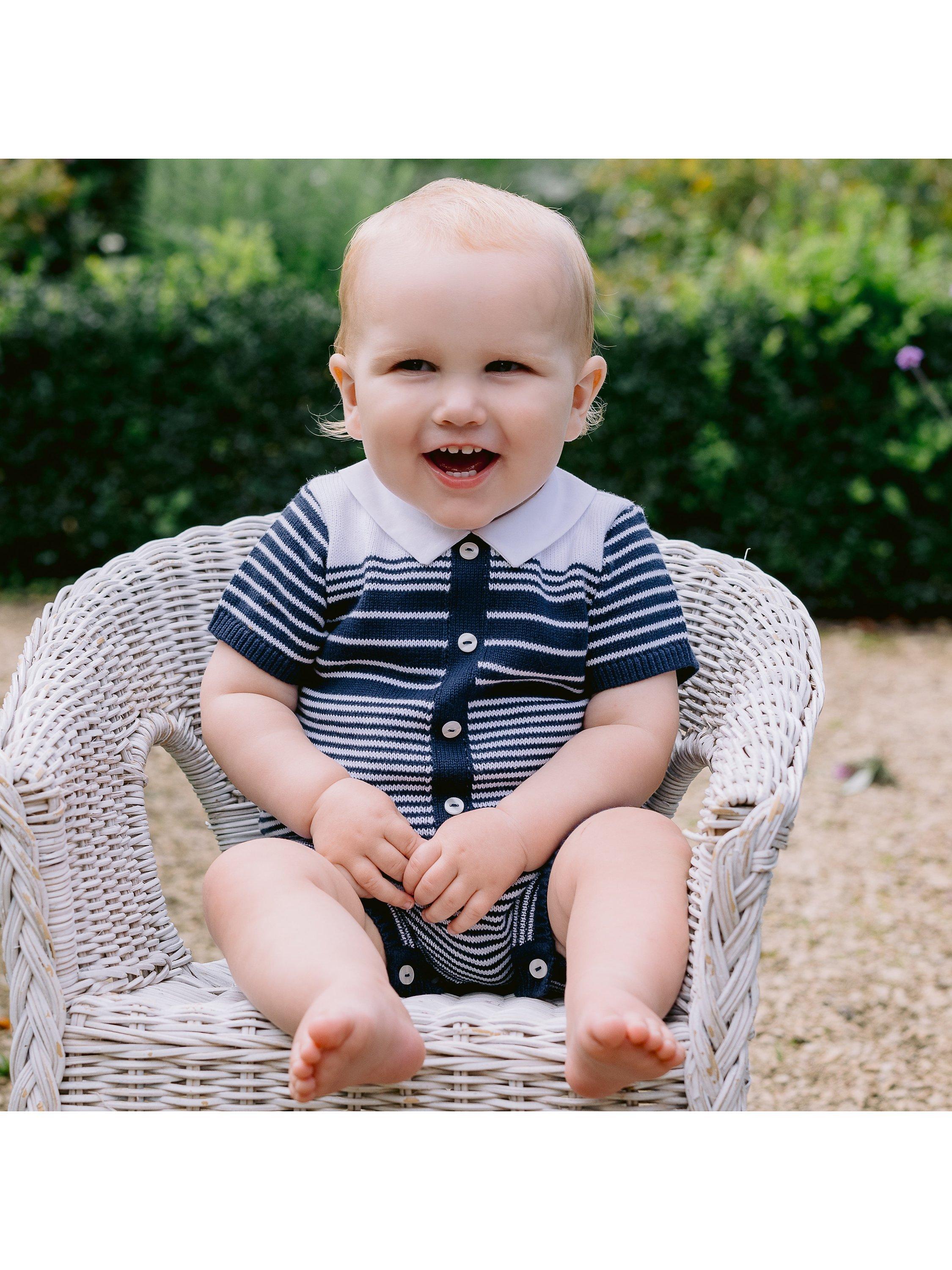 Product image 1 of 5, which shows Emile et Rose Baby Fabian Knitted Stripe Romper, Navy, 1 months