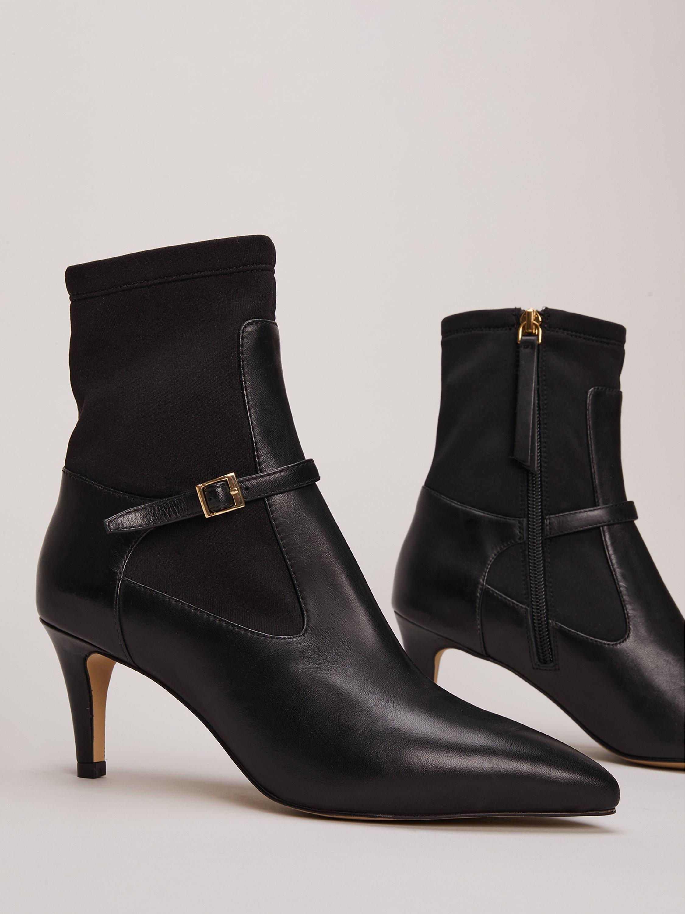 Product image 4 of 10, which shows Phase Eight Leather Buckle Detail Sock Boots, Black, EU38