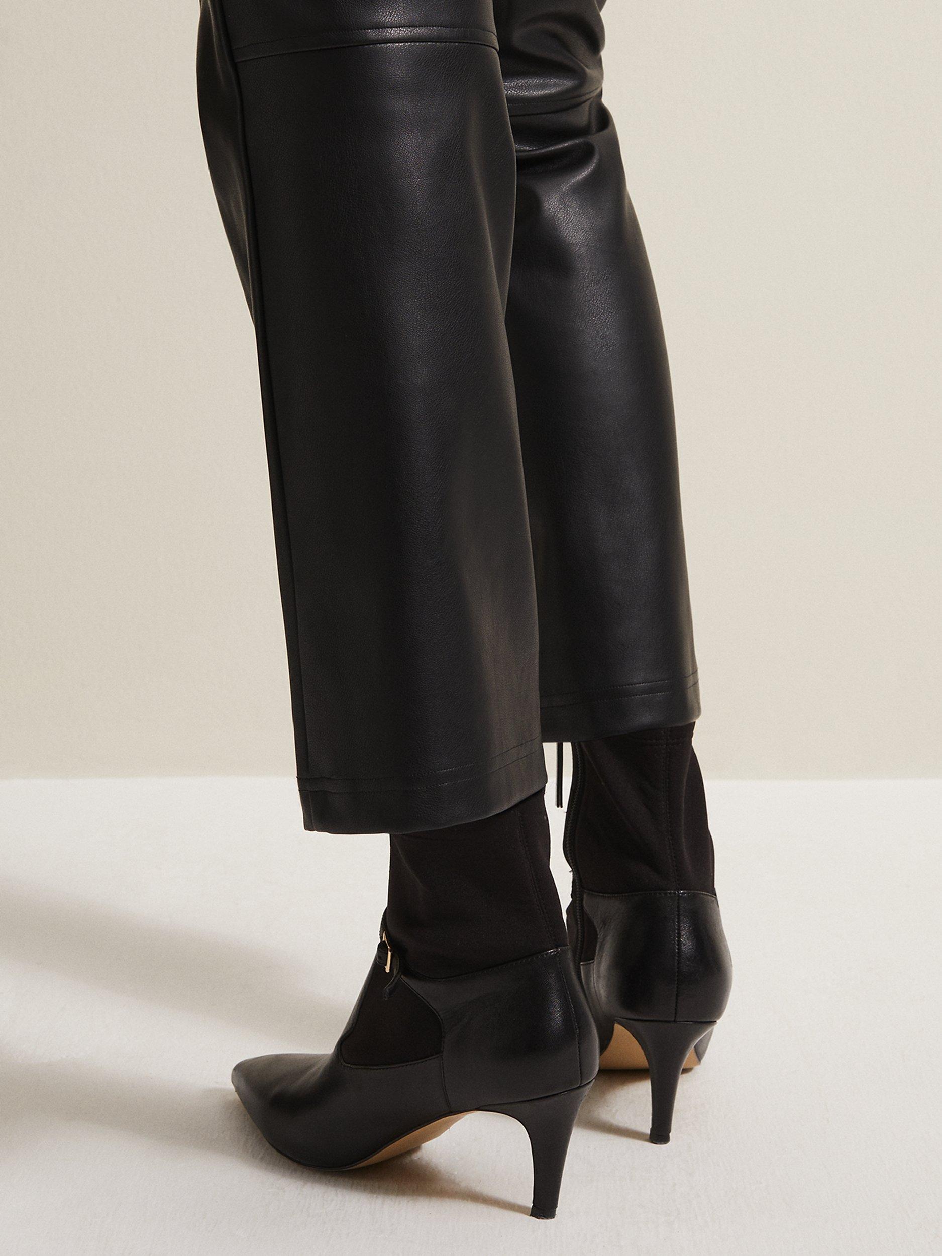 Product image 9 of 10, which shows Phase Eight Leather Buckle Detail Sock Boots, Black, EU38