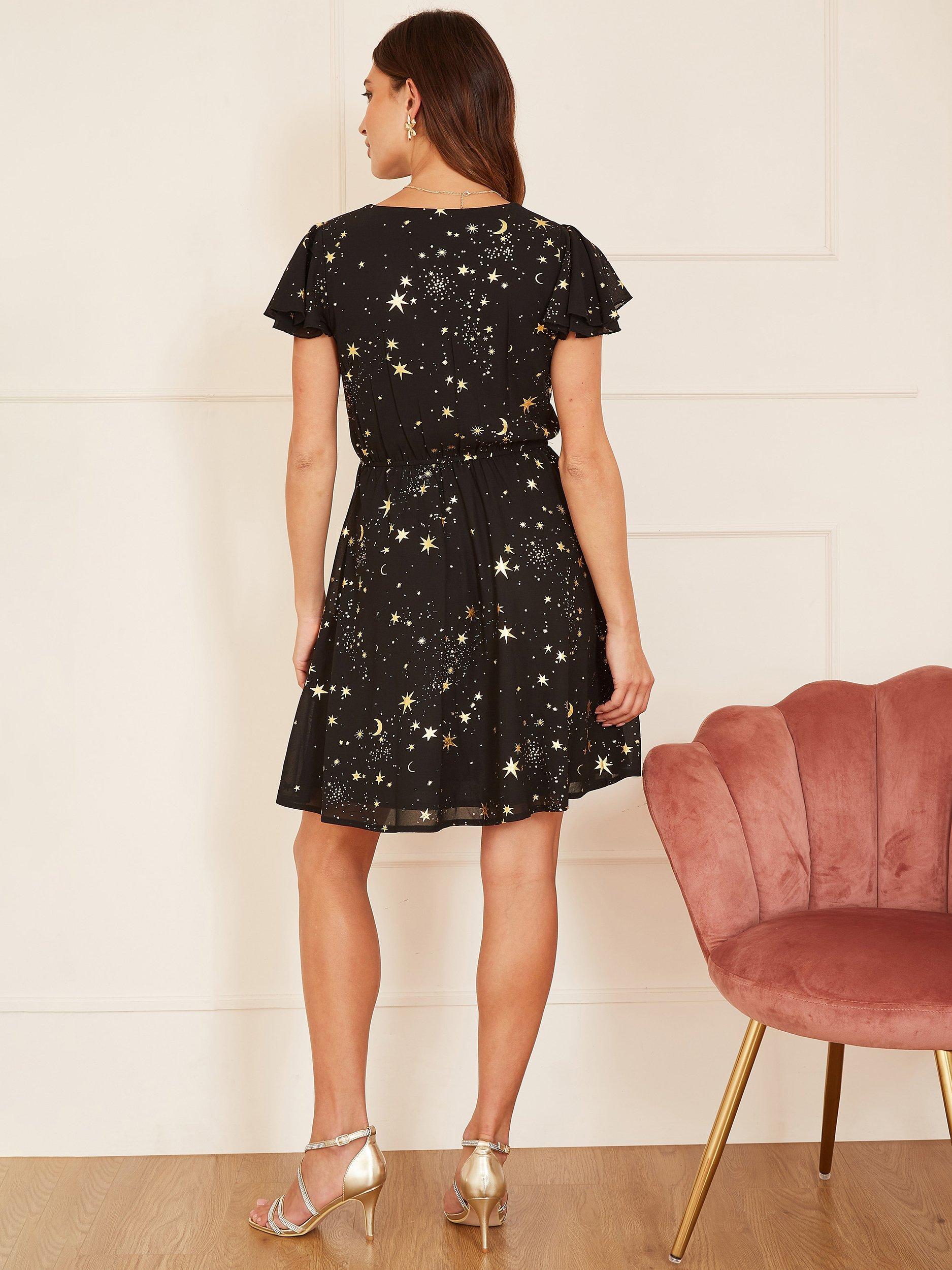 Product image 3 of 4, which shows Yumi Foil Star Print Wrap Skater Dress, Black, 8