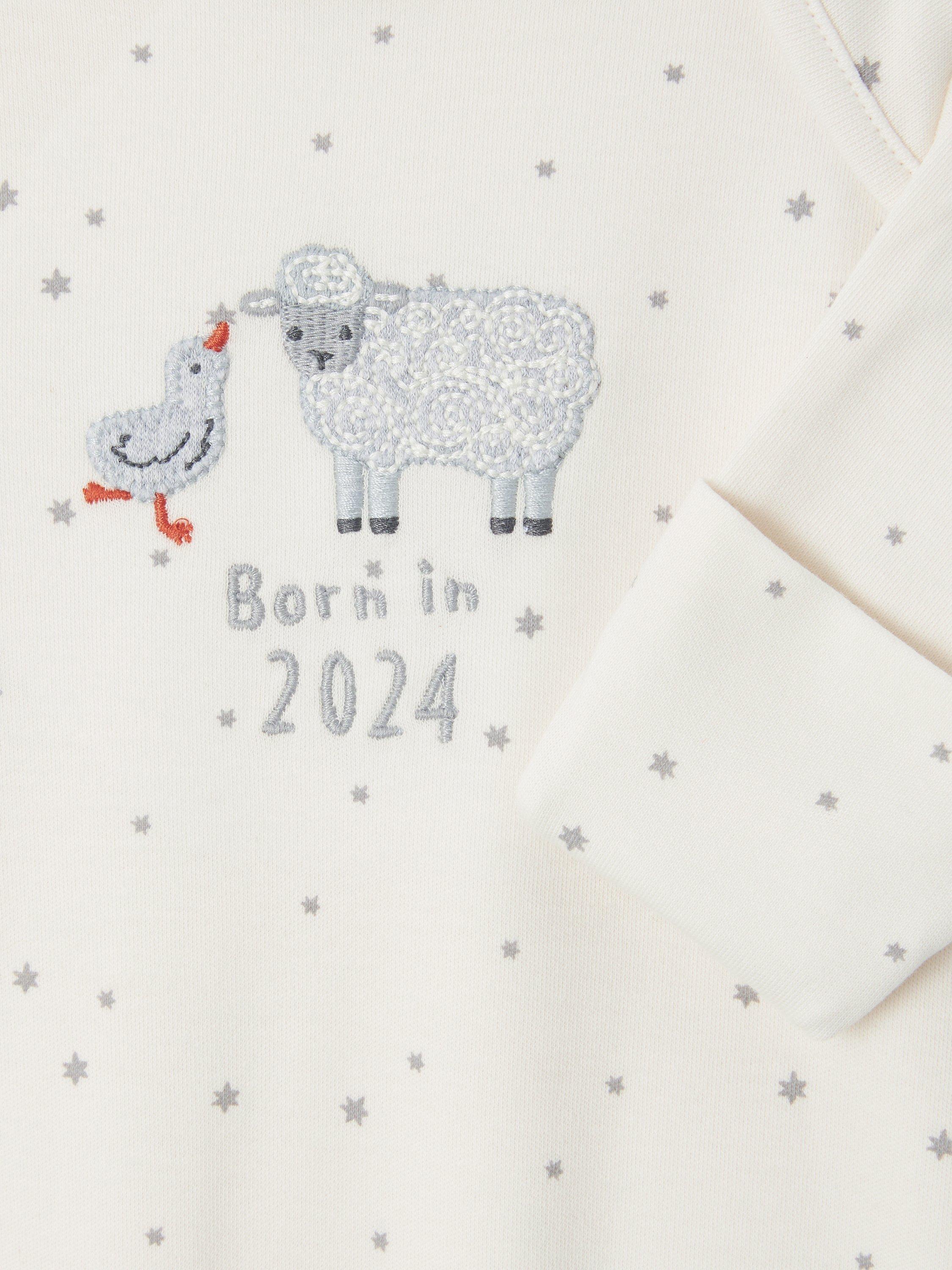 Product image 3 of 3, which shows John Lewis Baby Born in 2024 Star Sleepsuit, Cream, Newborn