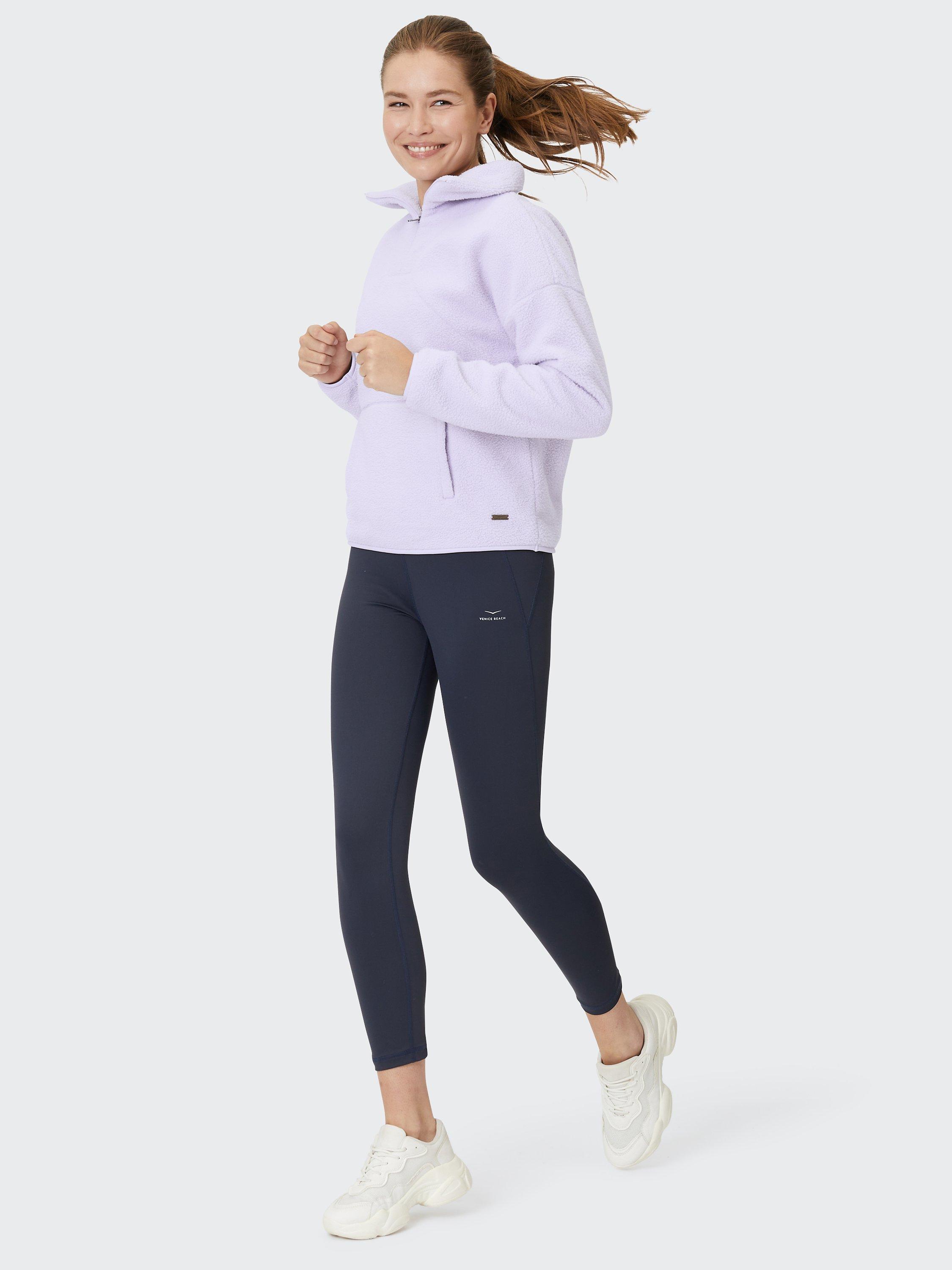 Product image 1 of 7, which shows Venice Beach Abby Zip Neck Top, Violet Haze, XS