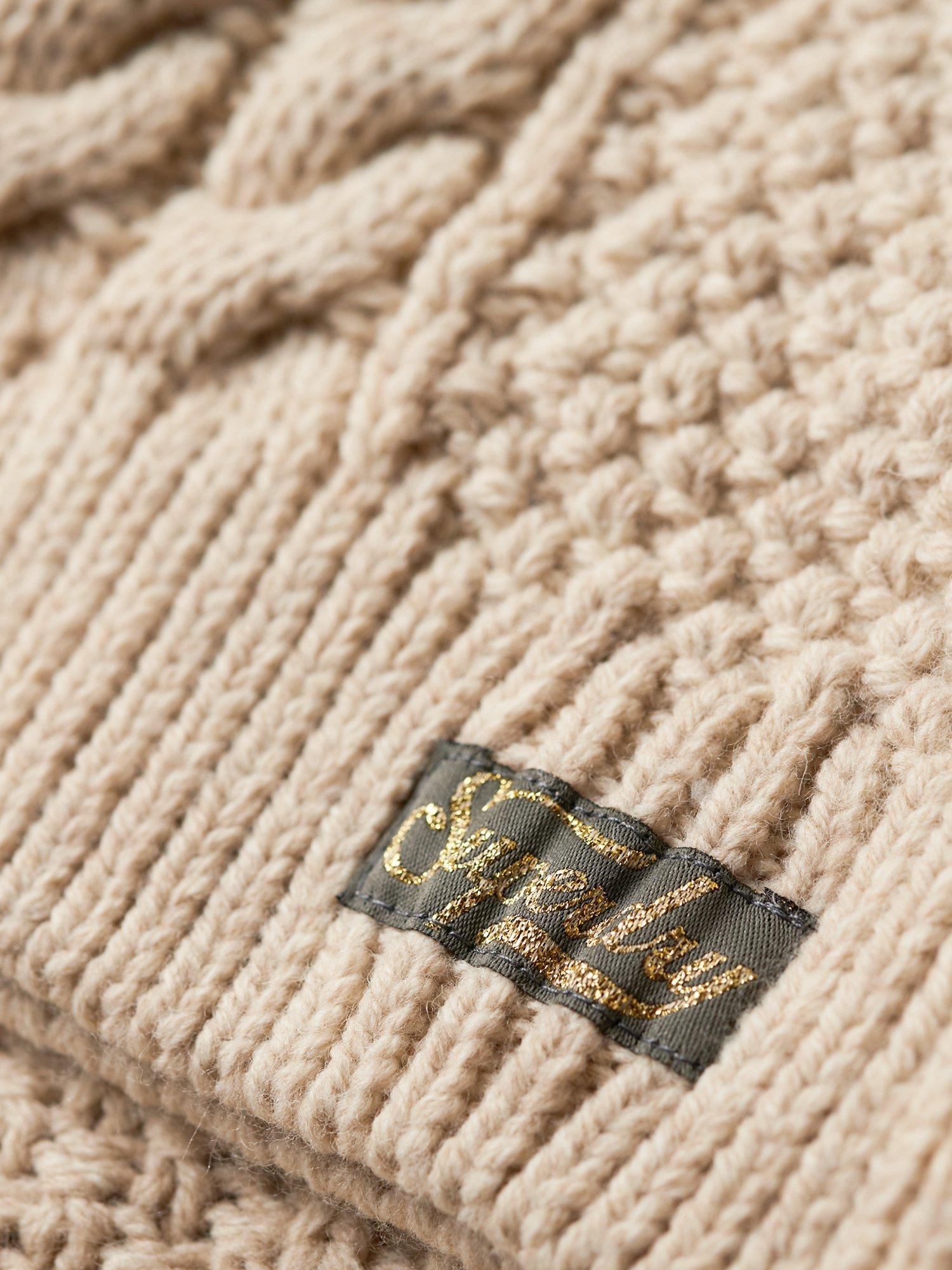 Product image 5 of 6, which shows Superdry Aran Cable Knit Polo Neck Jumper, Ecru, 8