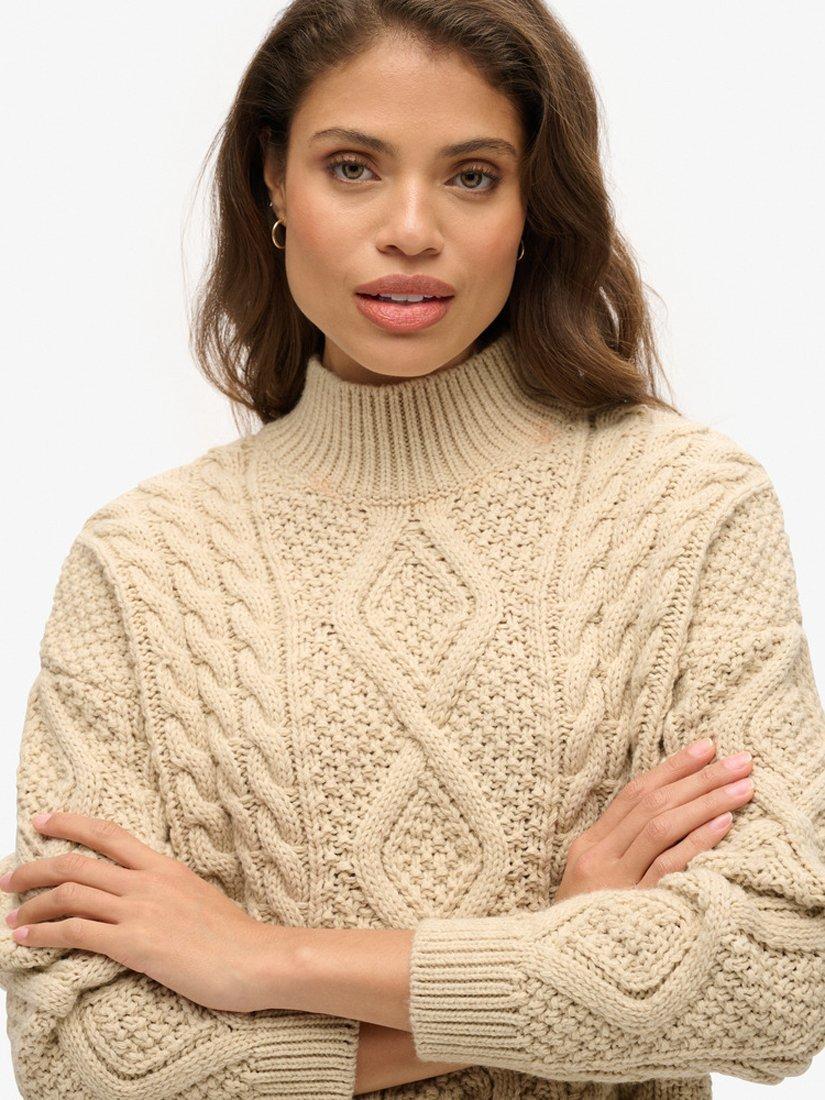 Product image 3 of 6, which shows Superdry Aran Cable Knit Polo Neck Jumper, Ecru, 8