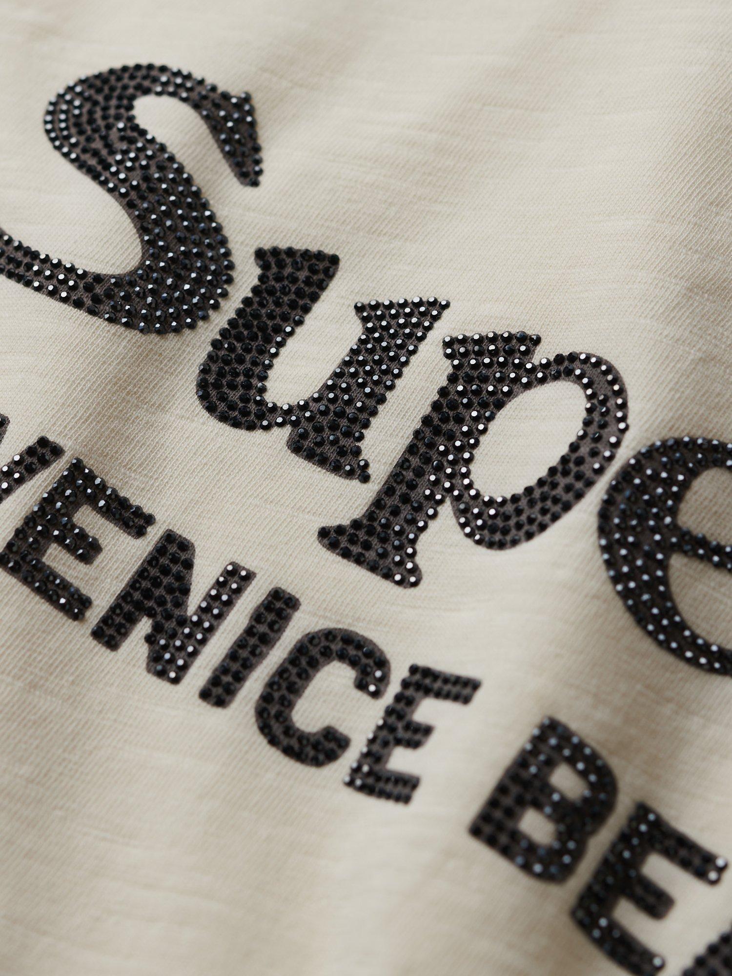 Product image 5 of 5, which shows Superdry Metallic Embellished Venue Relaxed T-Shirt, White/Black, White/Black, 8