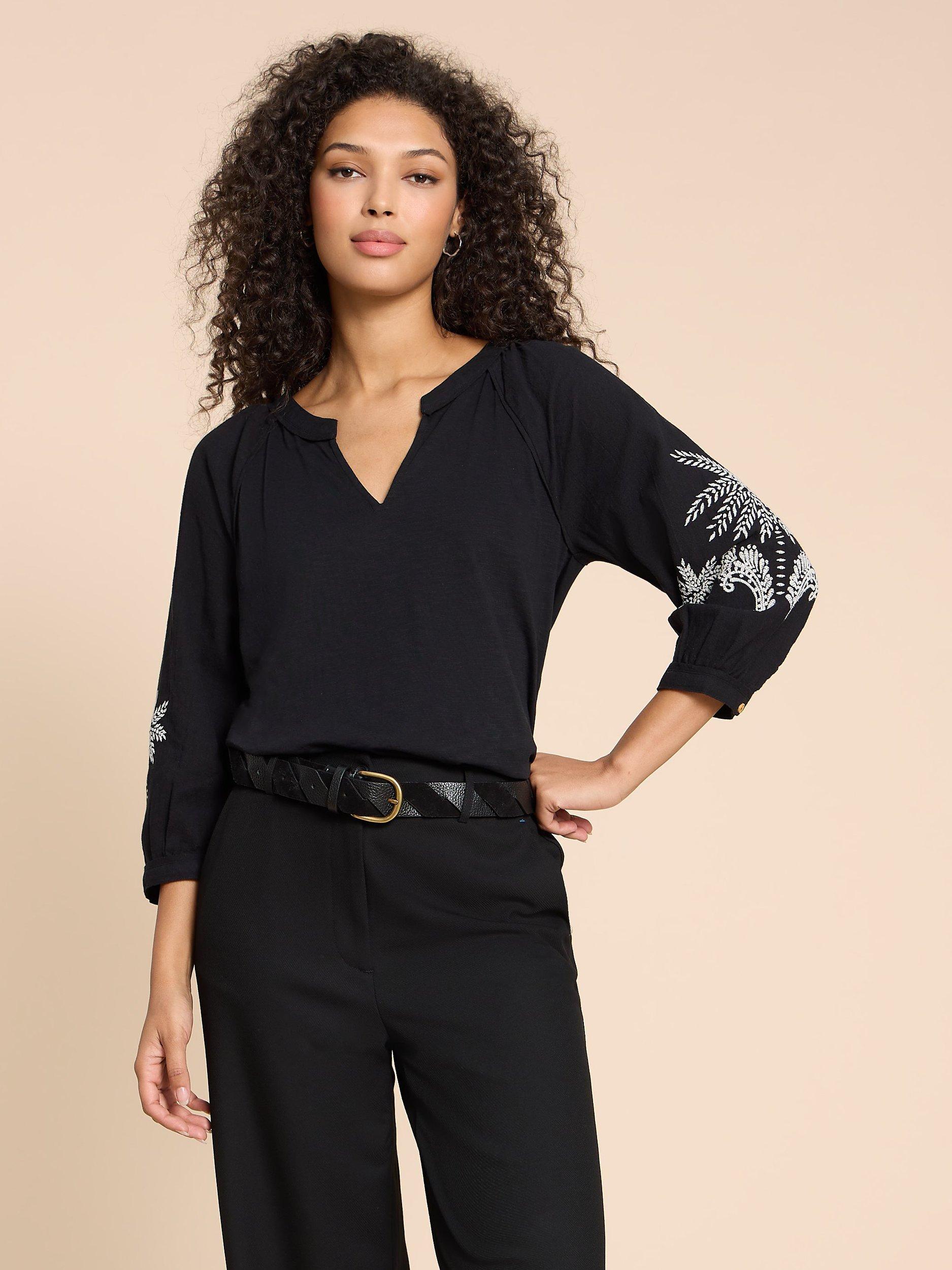 Product image 1 of 7, which shows White Stuff Millie Embroidered Sleeve Top, Black/Multi, 12