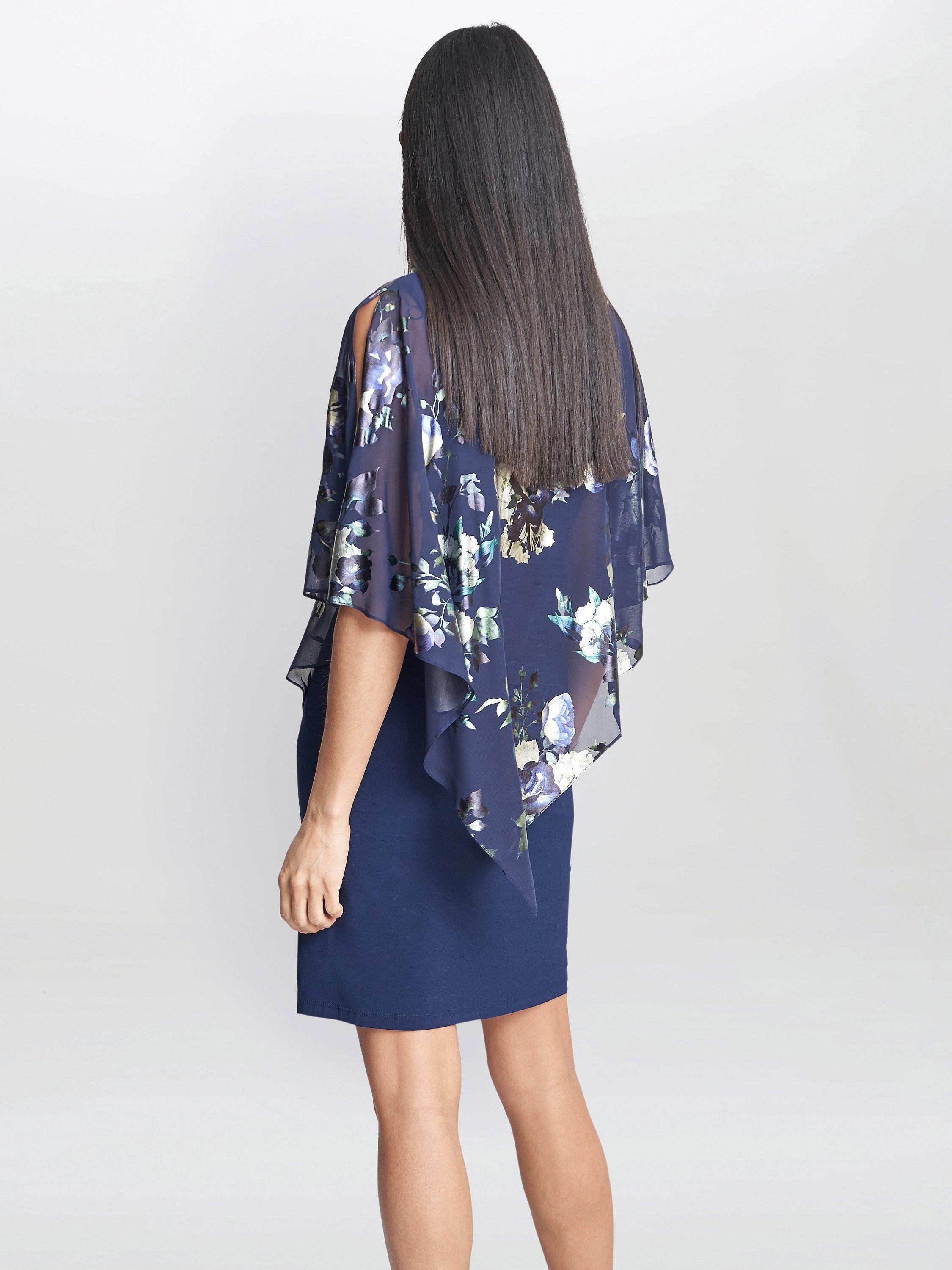 Product image 2 of 5, which shows Gina Bacconi Gaby Floral Print Asymmetric Cape Dress, Navy/Multi, 10