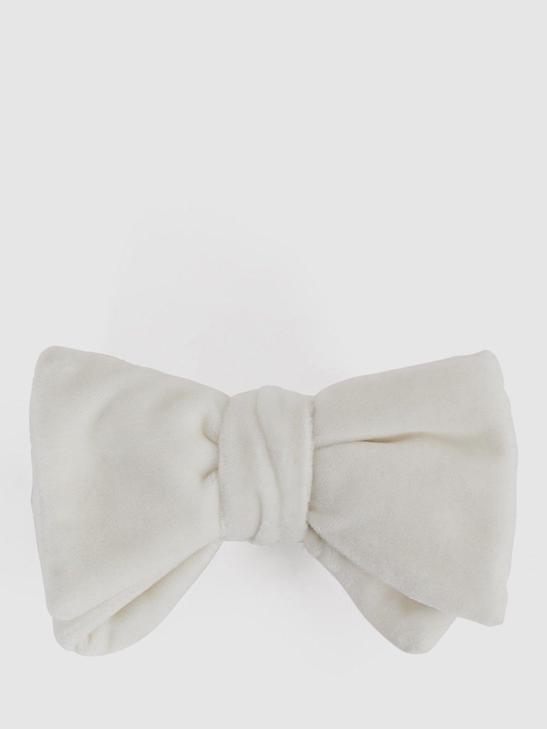 Product image 1 of 4, which shows Reiss Hike Velvet Bow Tie, Ivory, One Size
