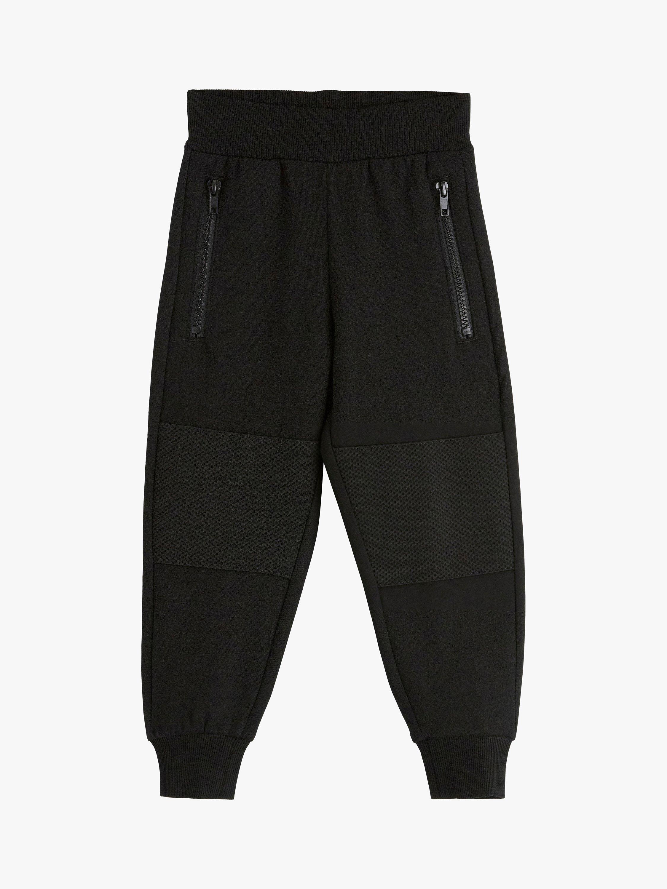 Product image 1 of 1, which shows Lindex Kids' Organic Cotton Mesh Knee Joggers, Black, 2 years
