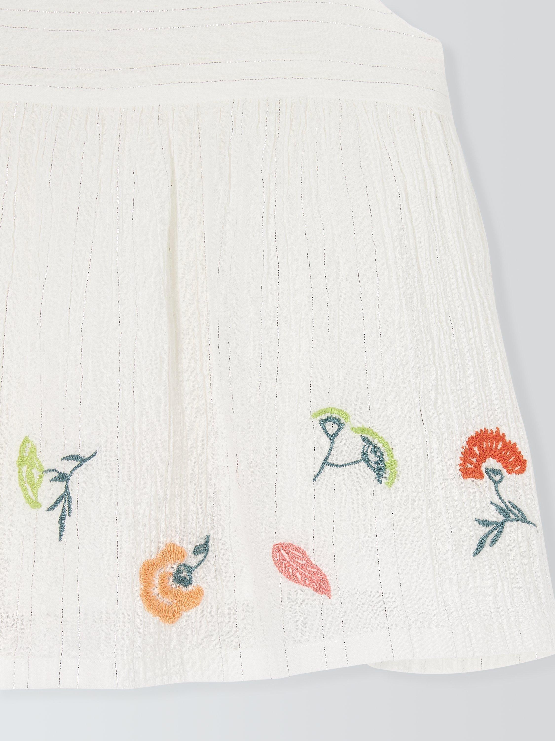 Product image 5 of 6, which shows John Lewis Kids' Metallic Thread Floral Embroidered Woven Top, White, 9 years