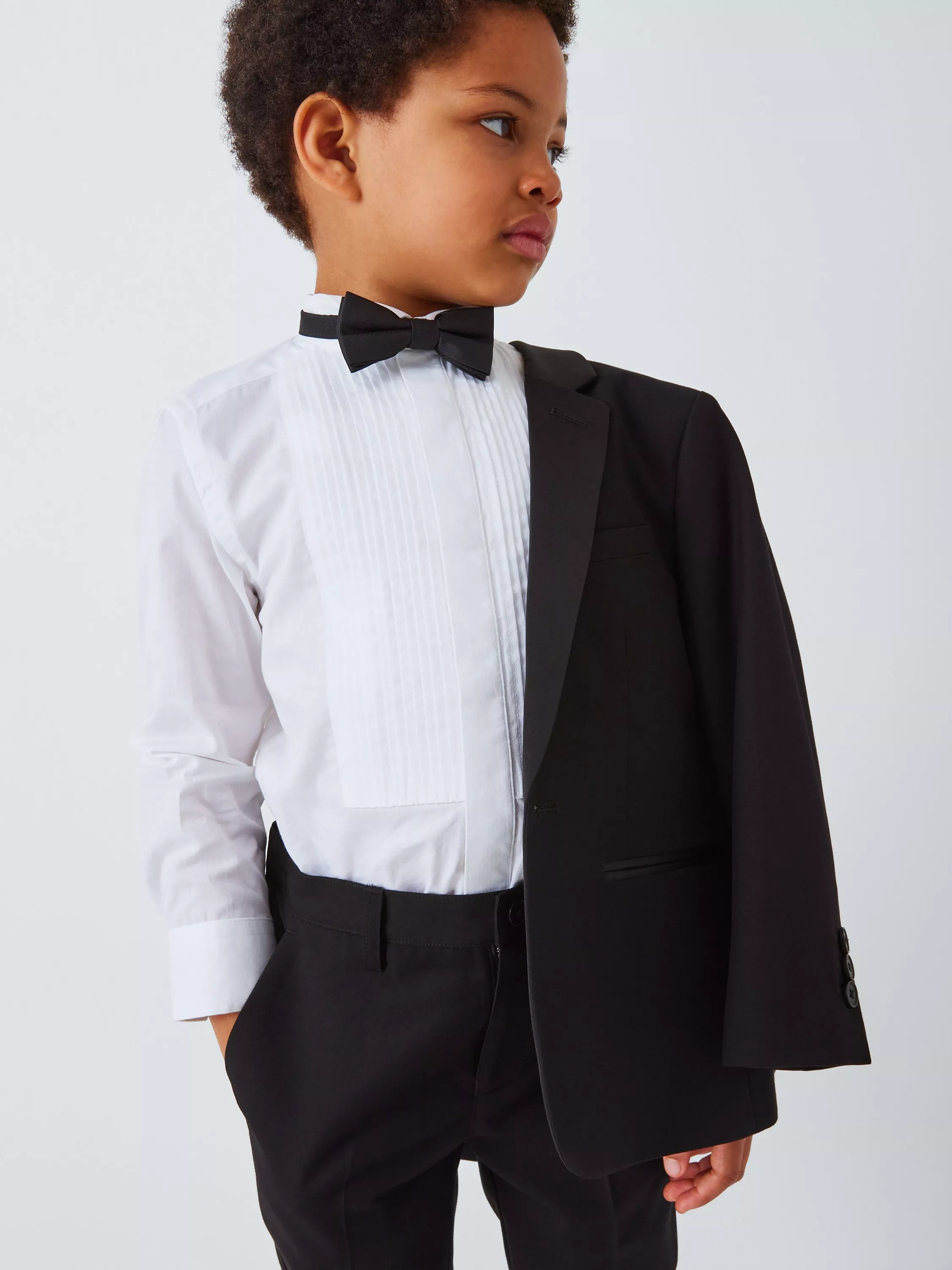 boy in tuxedo suit with bowtie