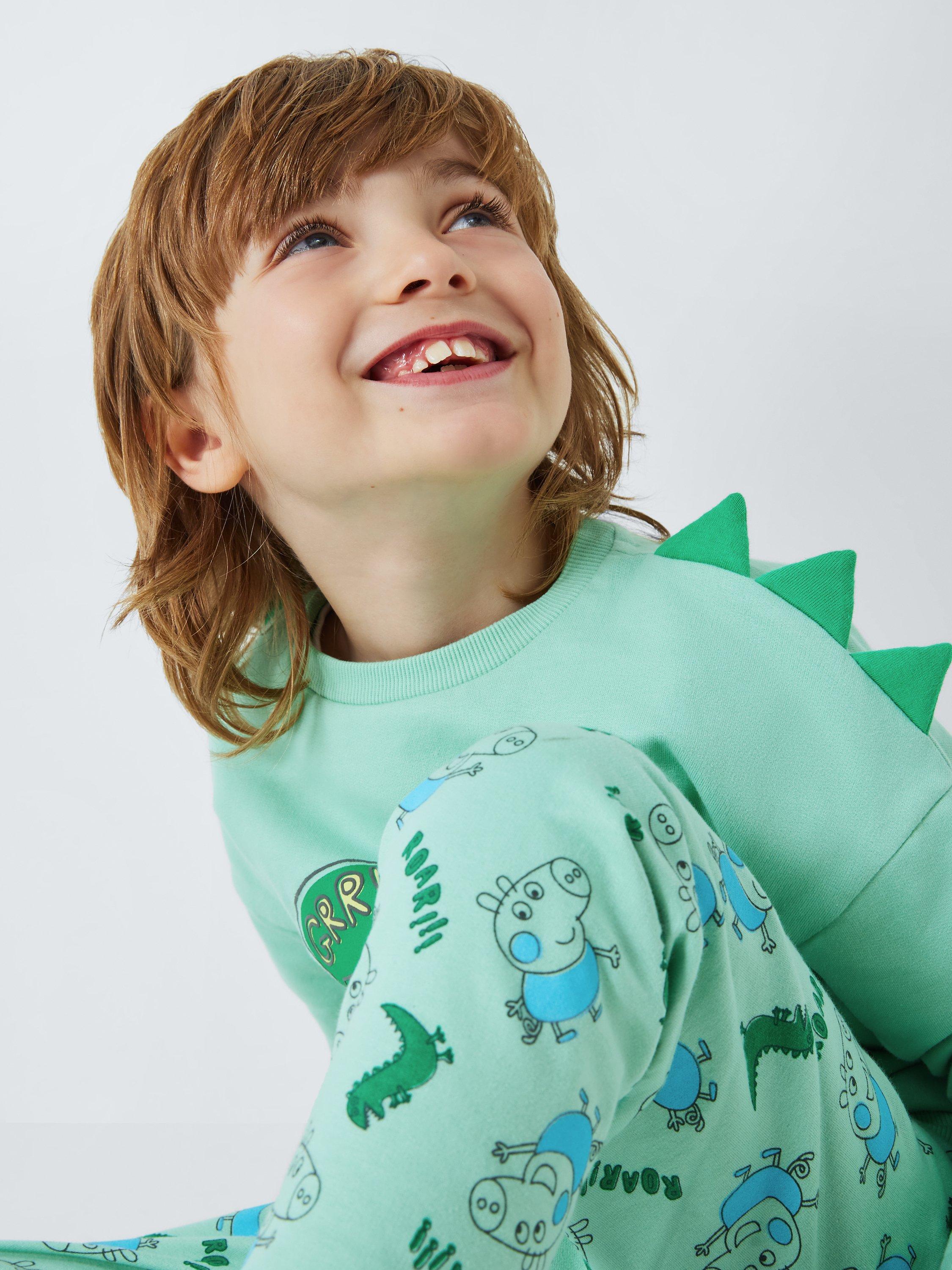 Product image 6 of 6, which shows Brand Threads Kids' Peppa Pig George 3D Spike Shoulder Jogger Set, Green, 5-6 years