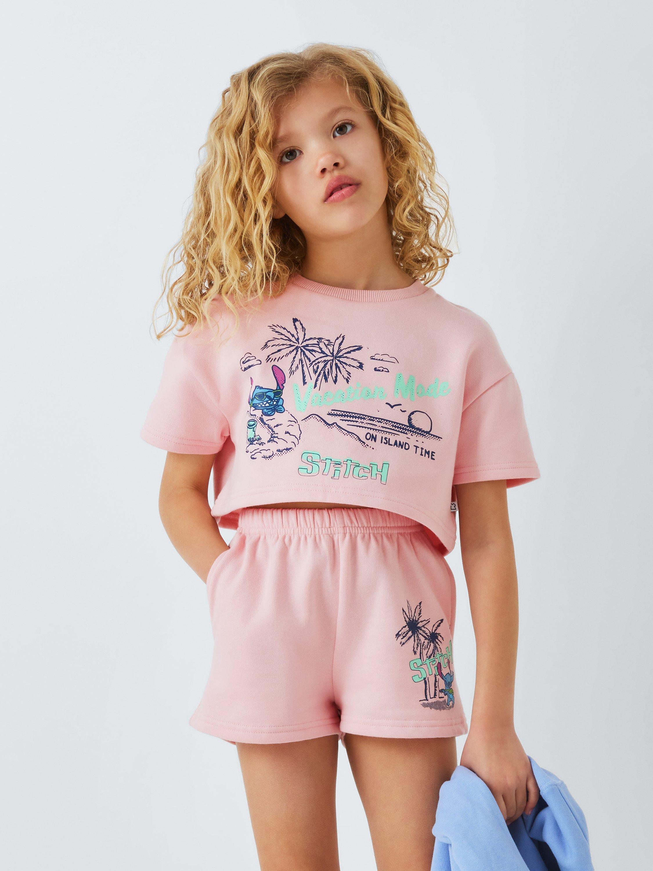 Product image 1 of 7, which shows Brand Threads Kids' Disney Lilo and Stitch Boxy Top & Shorts Set, Pink, 12-13 years