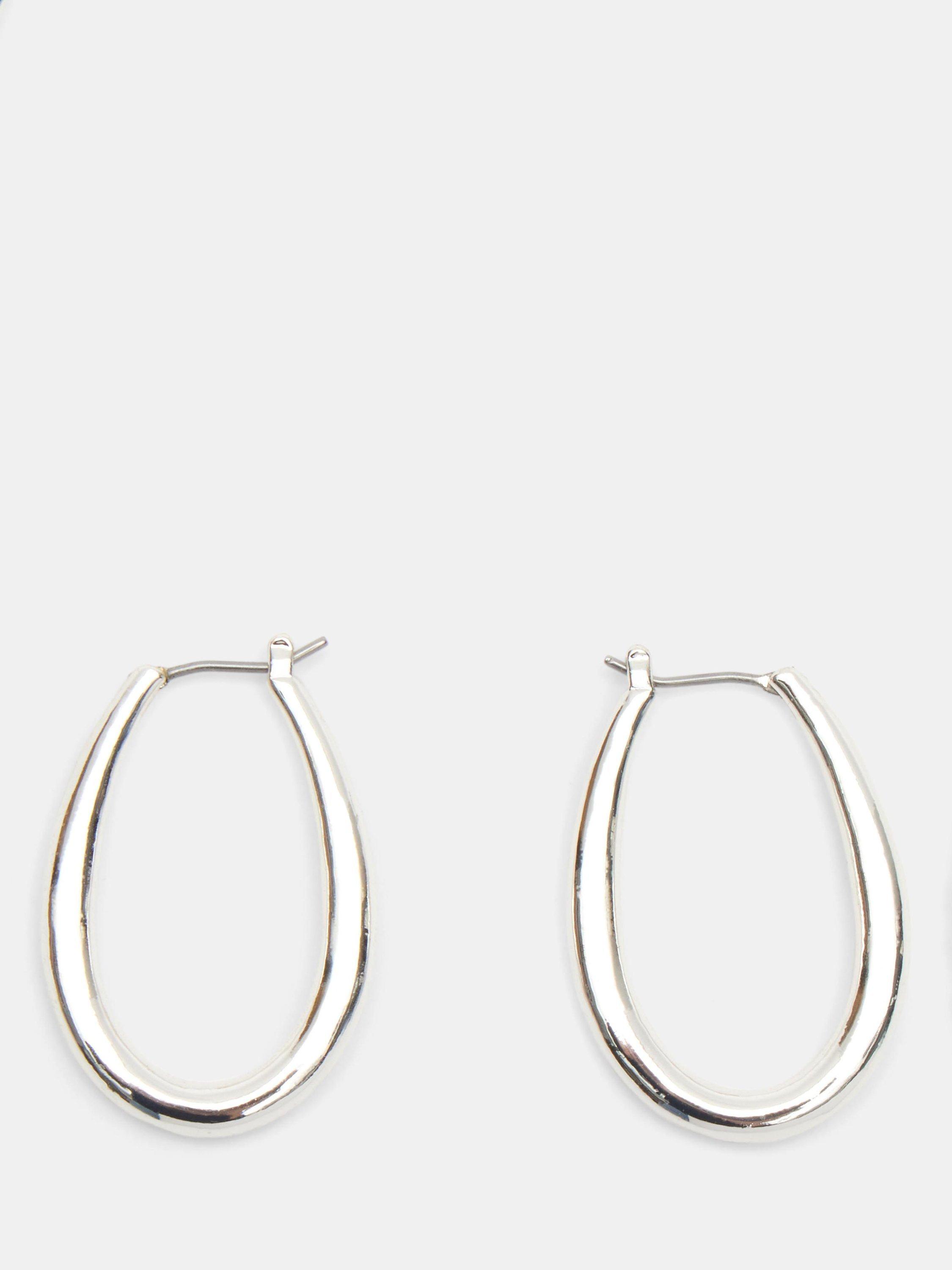 Product image 1 of 4, which shows HUSH Brooke Oval Hoop Earrings, Silver, One Size