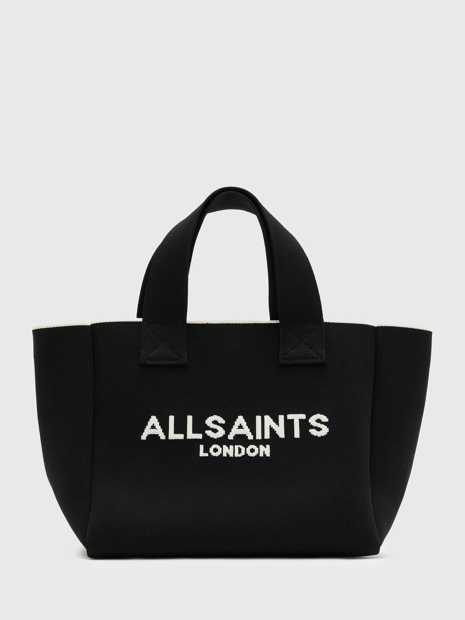Product image 1 of 6, which shows AllSaints Izzy Knitted Recycled Mini Tote Bag, Black, One Size