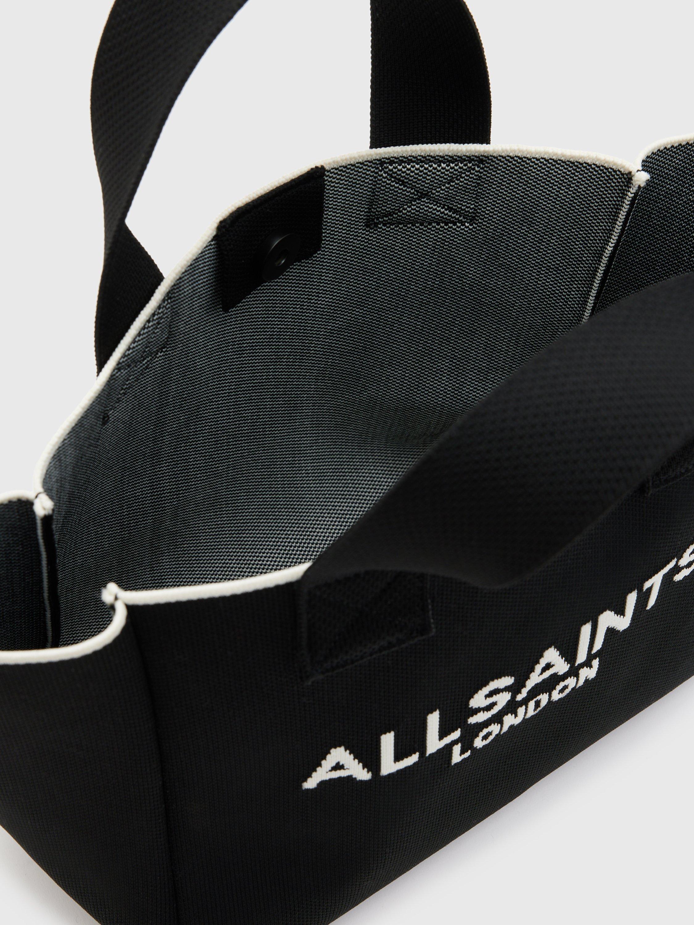 Product image 4 of 6, which shows AllSaints Izzy Knitted Recycled Mini Tote Bag, Black, One Size