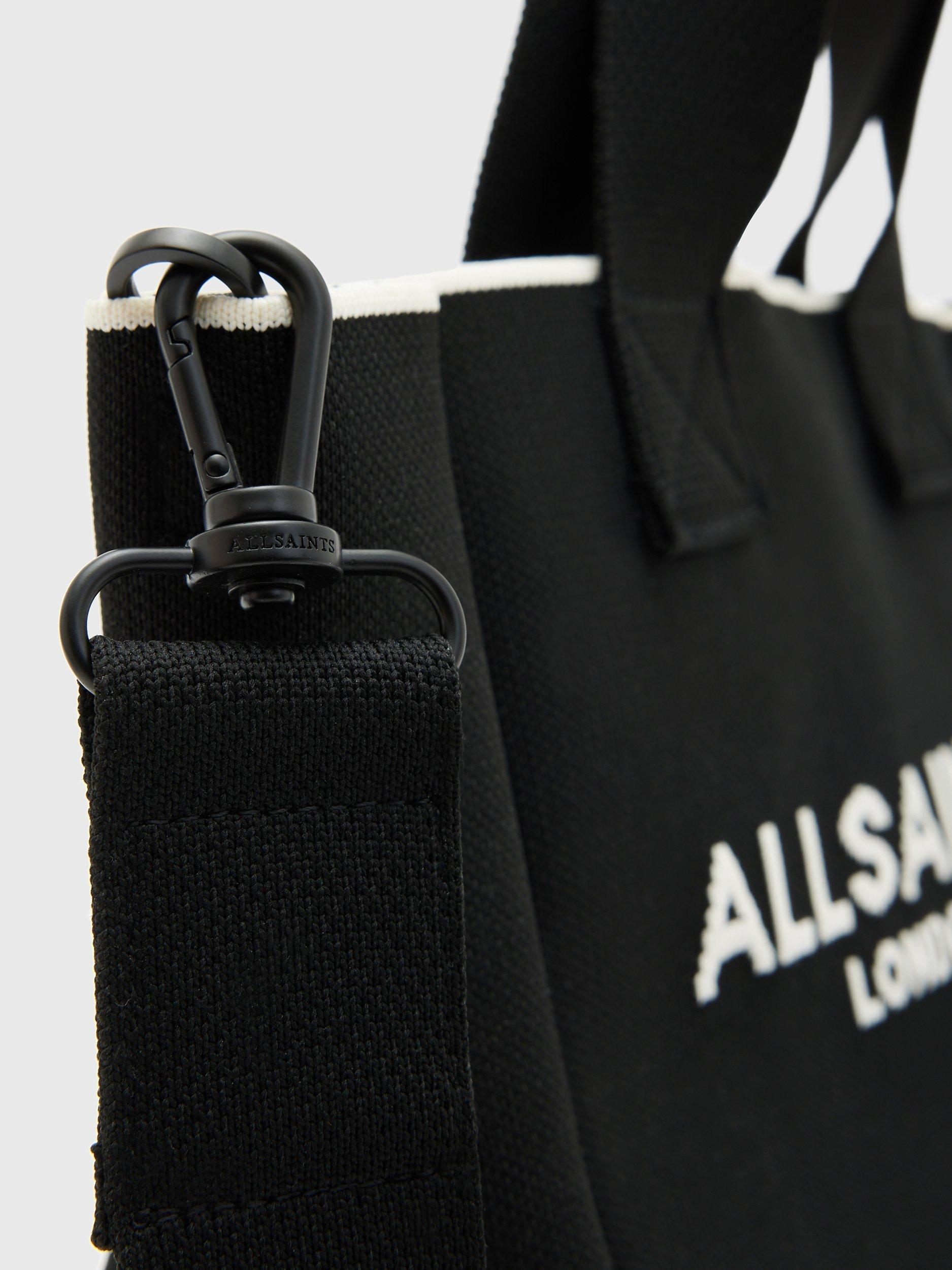 Product image 6 of 6, which shows AllSaints Izzy Knitted Recycled Mini Tote Bag, Black, One Size