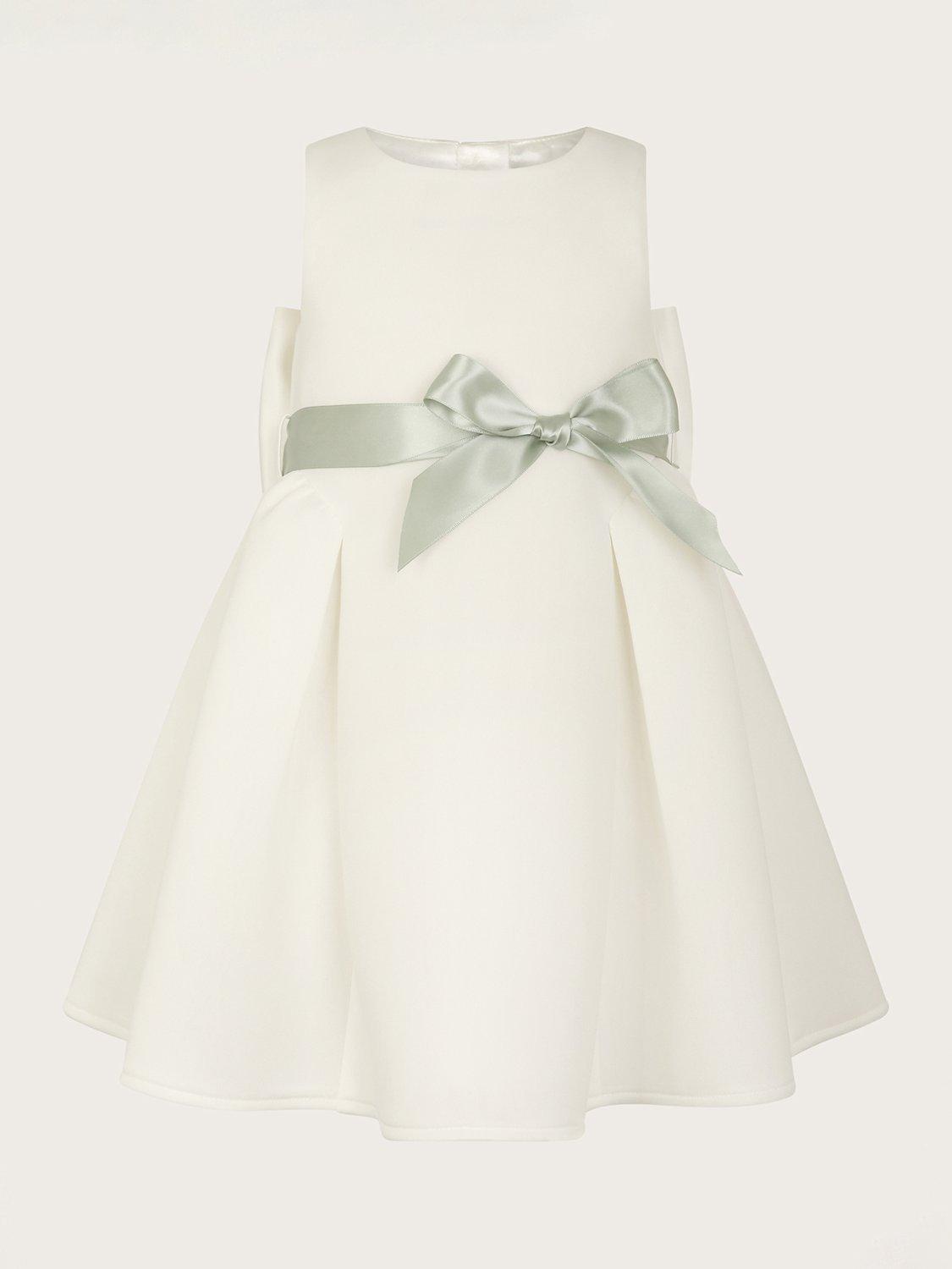 Product image 1 of 3, which shows Monsoon Baby Holly Bow Scuba Bridemaids Dress, Ivory, 0-3 months